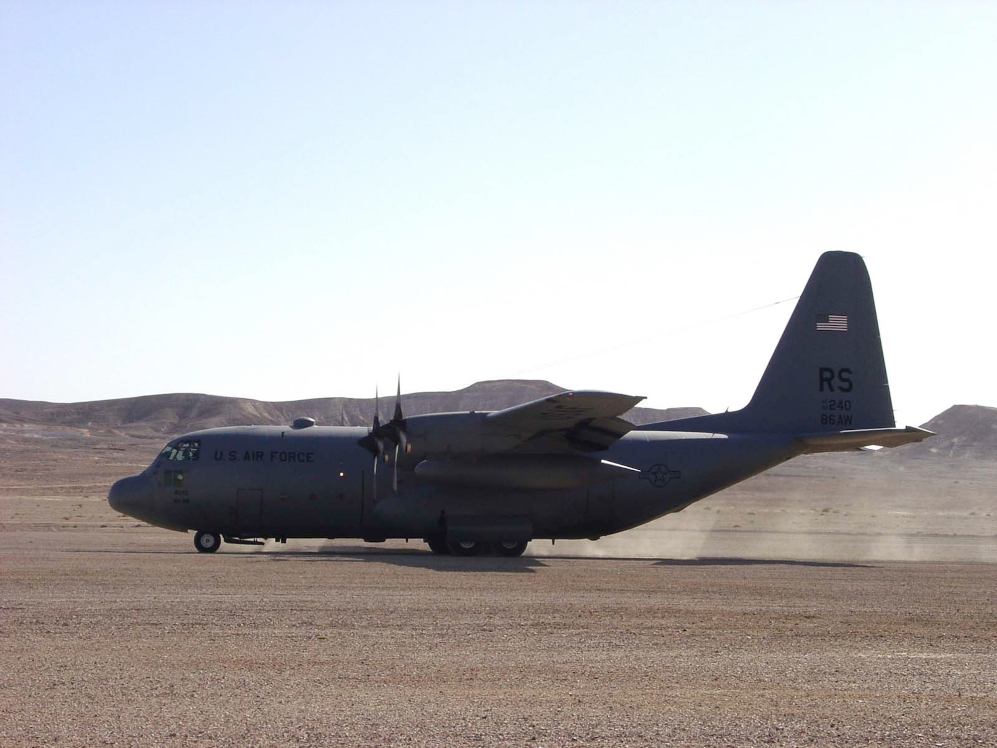 A Ramstein C-130 performs an assault landing on a dirt landing zone in Israel. Members from the 37th Airlift Squadron recently participated in an off-station trainer in Israel. Several Ramstein Airmen also participated in the trainer to ensure the squadron received essential support. 
