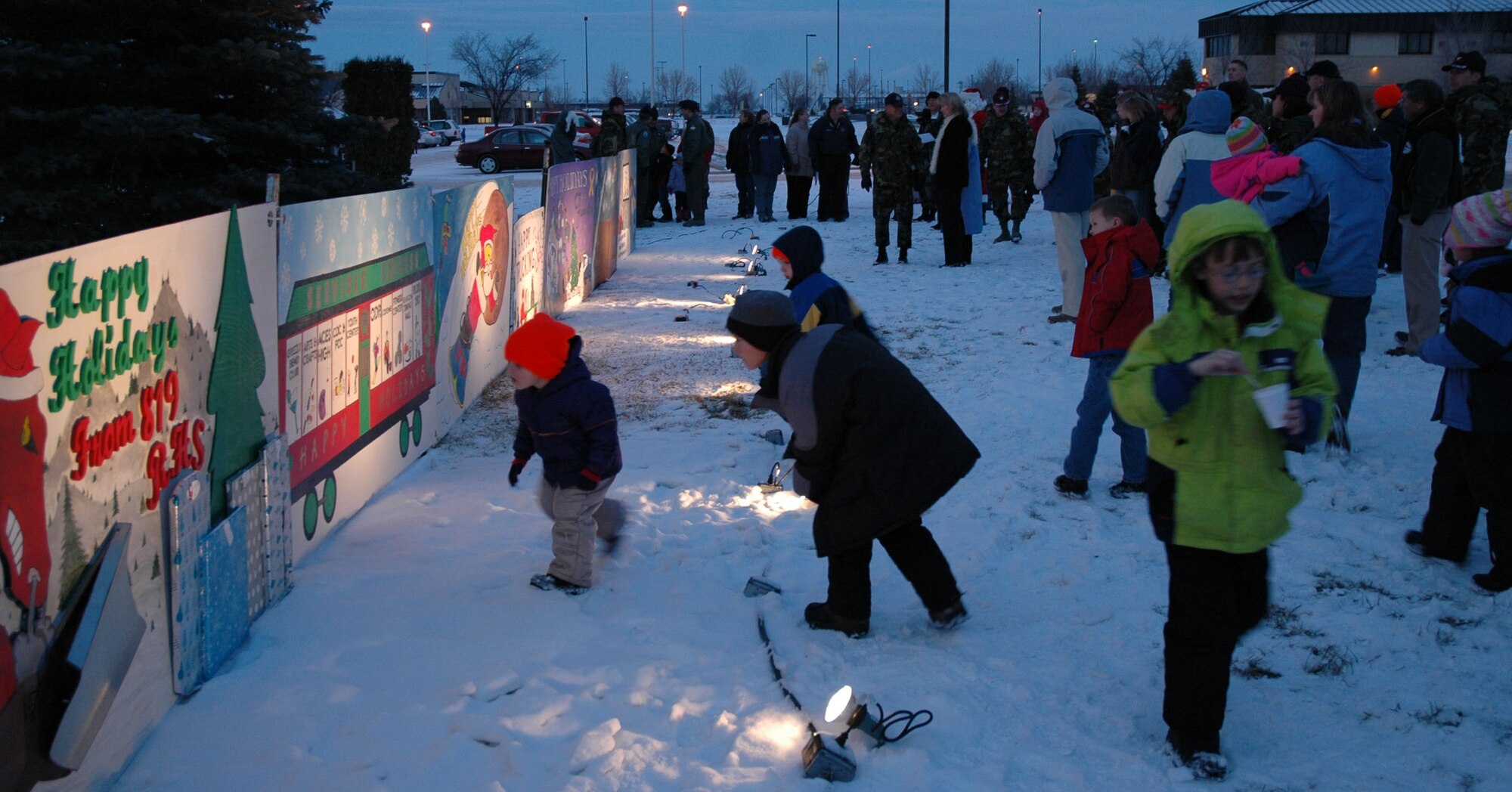Little Warriors view holiday cards that were made by 341st Space Wing squadrons and organizations [at the Grizzly Bend Club] Nov. 29. The 341st Medical Operations Group won first place, the 341st Mission Support Squadron took second and the 341st Comptroller Squadron took third. (U.S. Air Force photo/Airman 1st Class Dillon White)