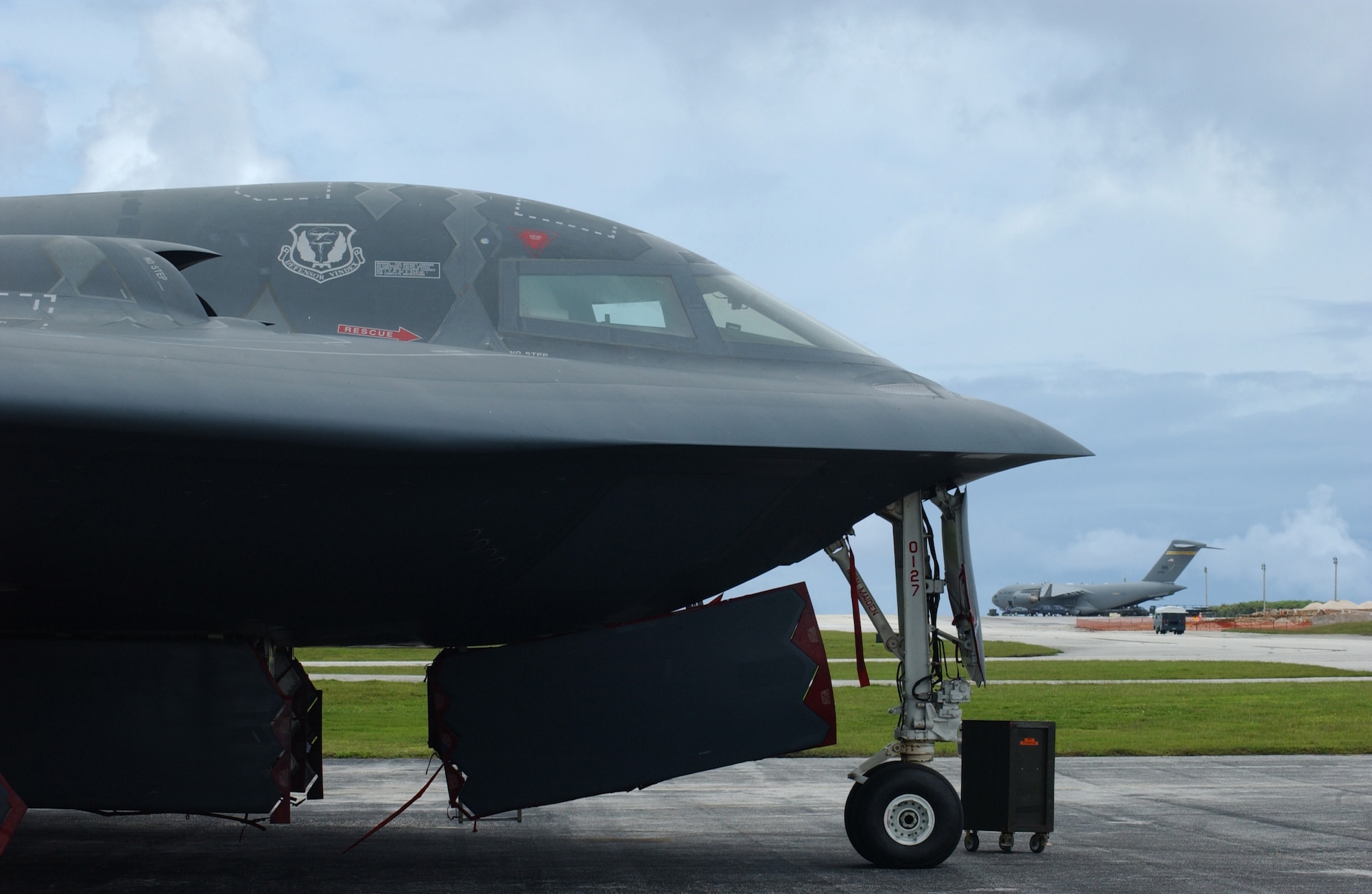 The sleek bird-of-prey profile of the B-2 Spirit stealth bomber is ready to pounce on any aggressor that threatens the U.S. or allied nations. Members of the B-2 community recently performed a symbolic flyover of Pearl Harbor to mark the anniversary of the Dec. 7, 1941, attack by Japanese Imperial naval and air forces. This attack forced the nation into World War II. President George W. Bush declared December 7 Pearl Harbor Remembrance Day in 2001. The occasion has since been marked by memorials, ceremonies and installation flags lowered to half staff every December 7. (Air Force photo/Senior Airman Brian Kimball)

