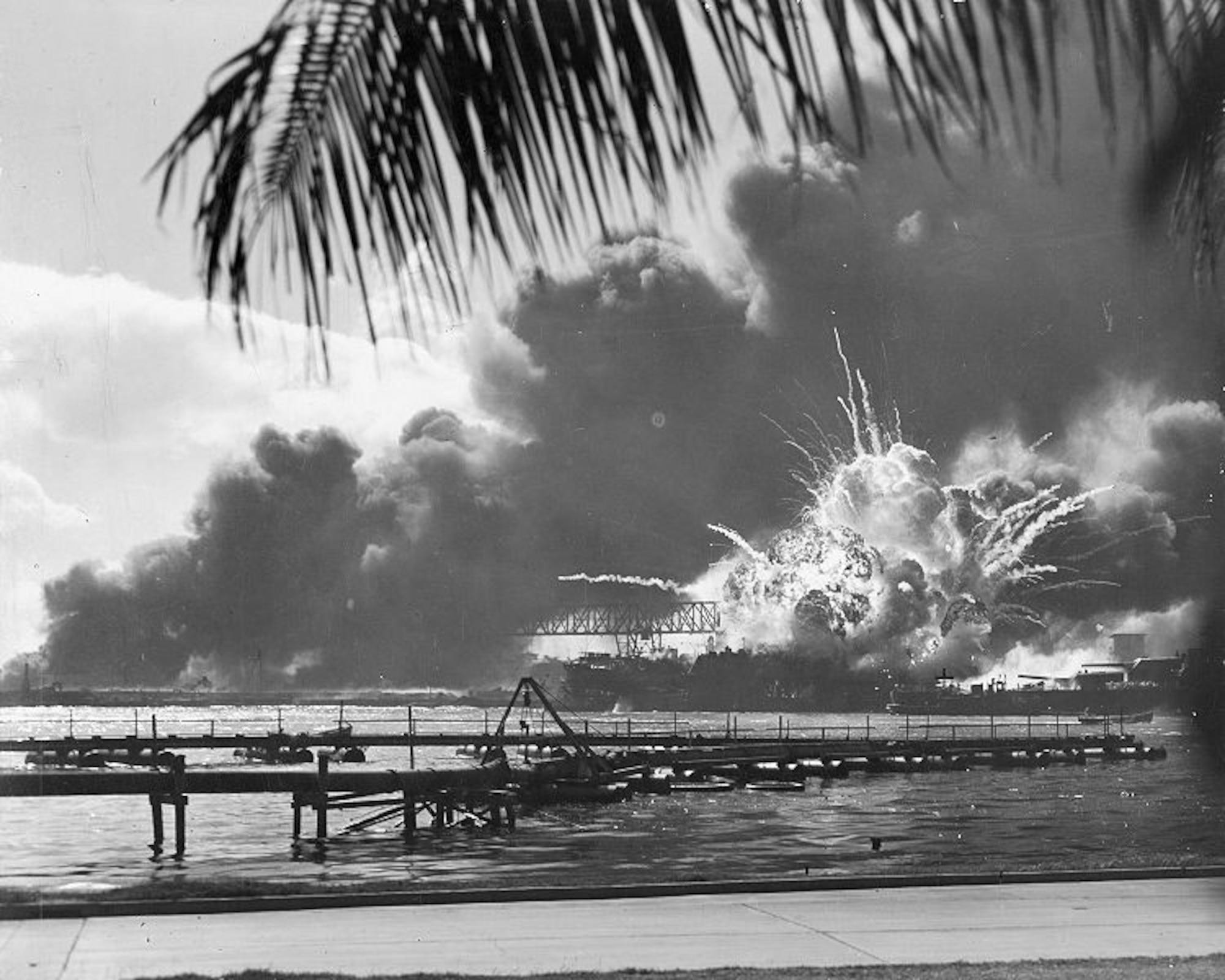 A navy photographer snapped this photograph of the Japanese attack on Pearl Harbor in Hawaii on December 7, 1941, just as the USS Shaw exploded. (Courtesy photo/U.S. Navy)