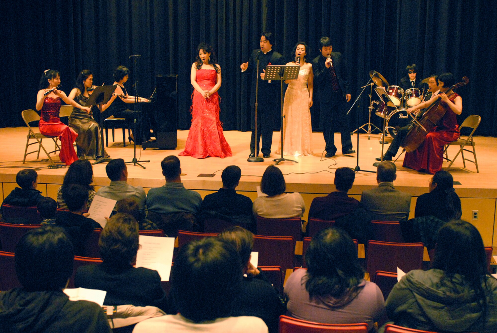 OSAN AIR BASE, Republic of Korea --  Students and professors from Pyeongtaek Unversity's music department perform the song "Tonight" during a concert at the Osan American High School on Dec. 5. This is the third year the university has entertained team Osan with music and dance. (U.S. Air Force photo by Senior Master Sgt. Marvin Krause)