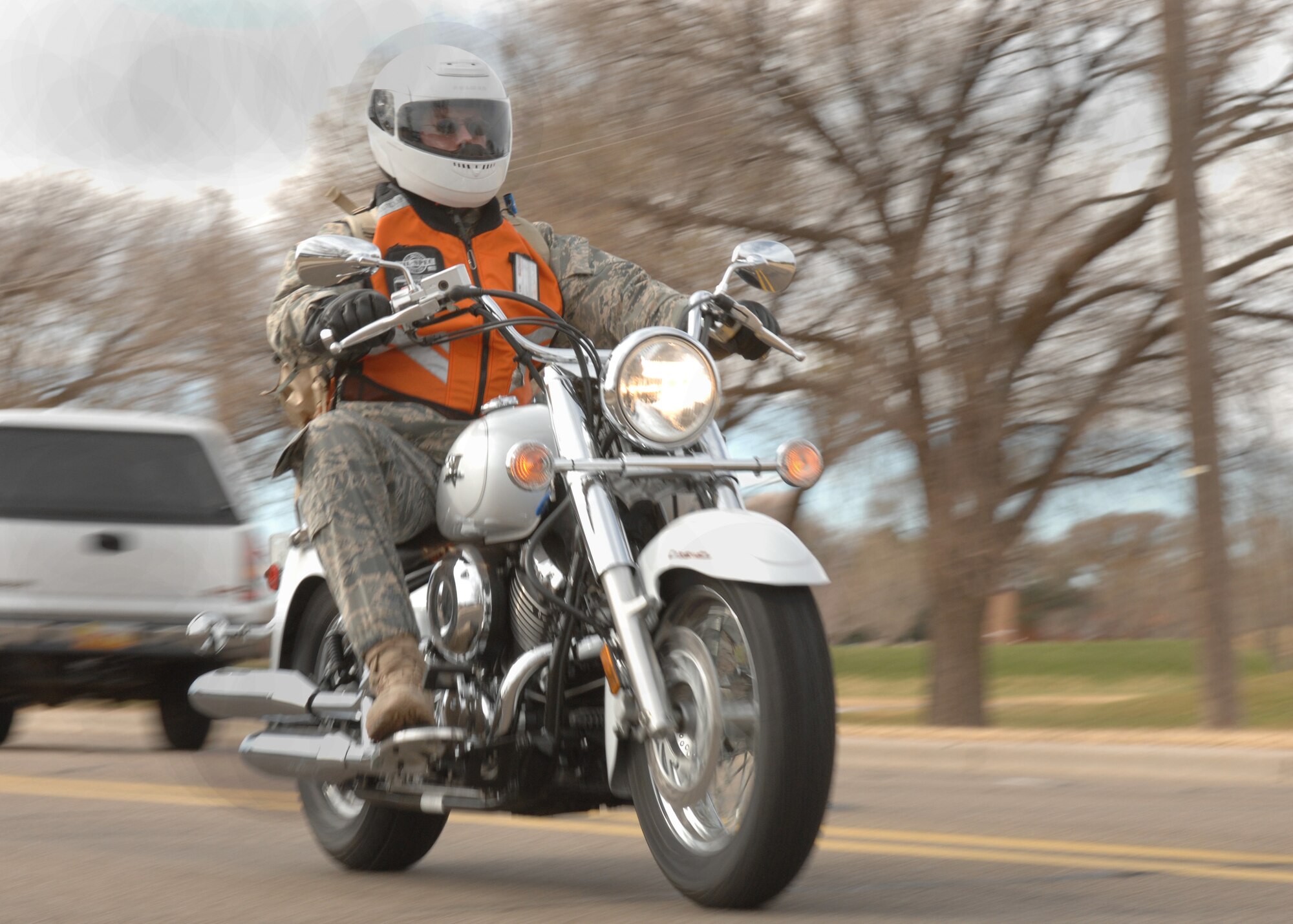 CANNON AIR FORCE BASE, N.M. - Maj. Ryan Rowe, 27th Special Operations Component Maintenance Squadron commander and rider with Cannon's motorcycle rider's group, rides out of base toward Clovis' food bank. The group took donated food to the food bank to share in the holiday spirit. (U.S. Air Force photo by Airman 1st Class James Bell)