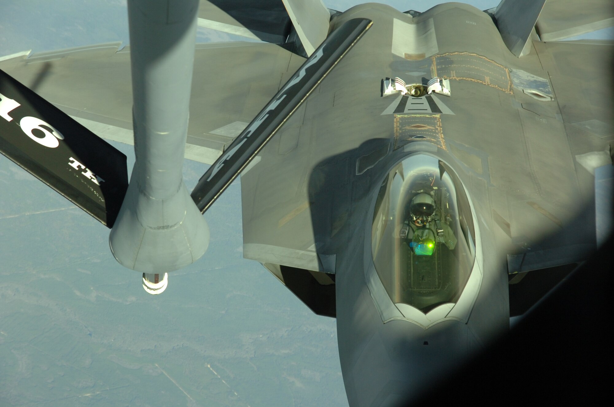 F-22 Raptor pilots from the 43rd Fighter Squadron, Tyndall AFB, Fla. conduct an air-to-air refueling training mission over Eglin AFB Dec. 4. The 916th Air Refueling Wing, which is an Air Force Reserve Wing located at Seymour Johnson AFB, N.C., provided KC-135R Stratotanker support during the mission. Tanker and fighter units from across the country travel to the Florida Panhandle to support the Raptor training mission based at Tyndall AFB. (U.S. Air Force photo/Staff Sgt. Bryan Franks)