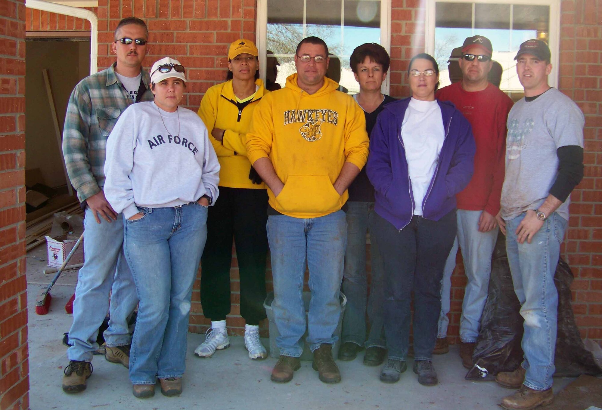 Members of the Tinker's Top-3 Organization volunteered with Central Oklahoma Habitat for Humanity to get three houses ready to be dedicated Nov. 27 and 29.  The homes were dedicated to their new owners Nov. 30.  Steve Mush, Habitat for Humanity volunteer coordinator, said they could not haved stayed on schedule without the Tinker Top-3's efforts.  (Courtesy photo)