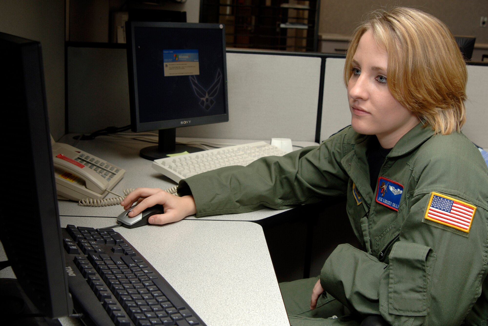 MCCONNELL AIR FORCE BASE, Kan. -- Airman 1st Class Lindsey Gillis, 349th Air Refueling Squadron, works on computer base training for mission certification training to become an in-flight refueling system operator on Nov. 26. In-flight refueling system operators make a difference by safely and completely checking the aircraft before any mission. (Photo by Airman 1stClass Roy Lynch III)