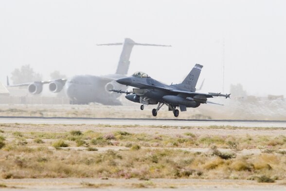 A Colorado Air National Guard F-16 Fighting Falcon takes off from Balad Air Base, Iraq.  F-16s fly various missions from armed over watch to shows of force and close air support as part of Operation Iraq Freedom.  (U.S. Air Force photo by Master Sgt. John Nimmo, Sr.)