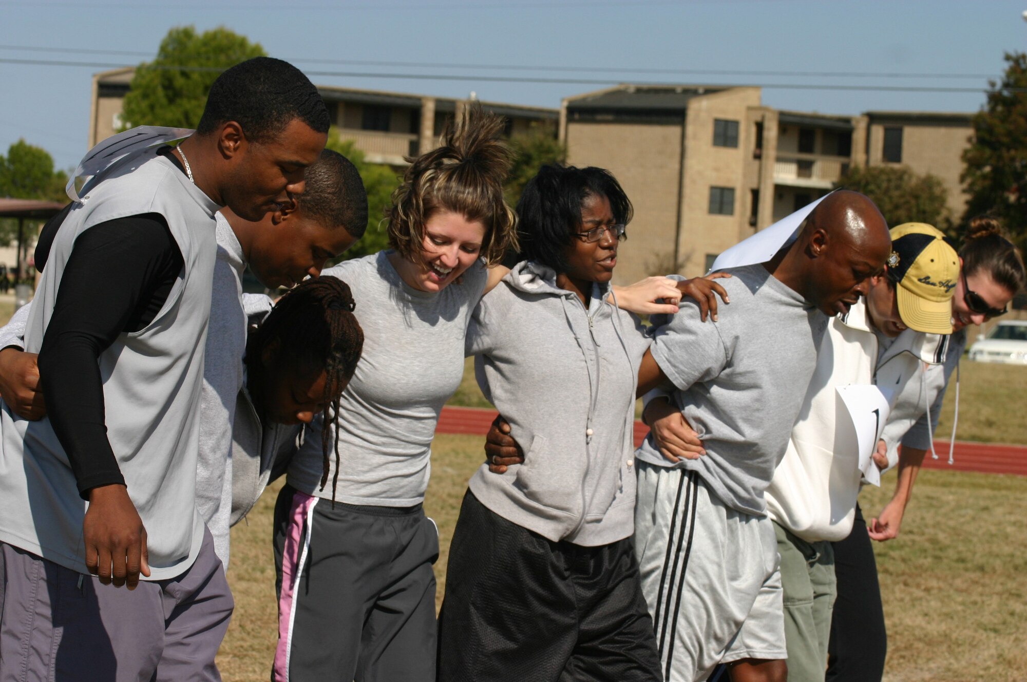 LAUGHLIN AIR FORCE BASE, Texas – A team from the 85th Flying Training Squadron works together on a team building challenge during Wingman Day Sept. 29. Wingman day consisted of several events to encourage teamwork and provide information on emotional, social, spiritual and physical health. (U.S. Air Force photo by Airman Sara Csurilla)
