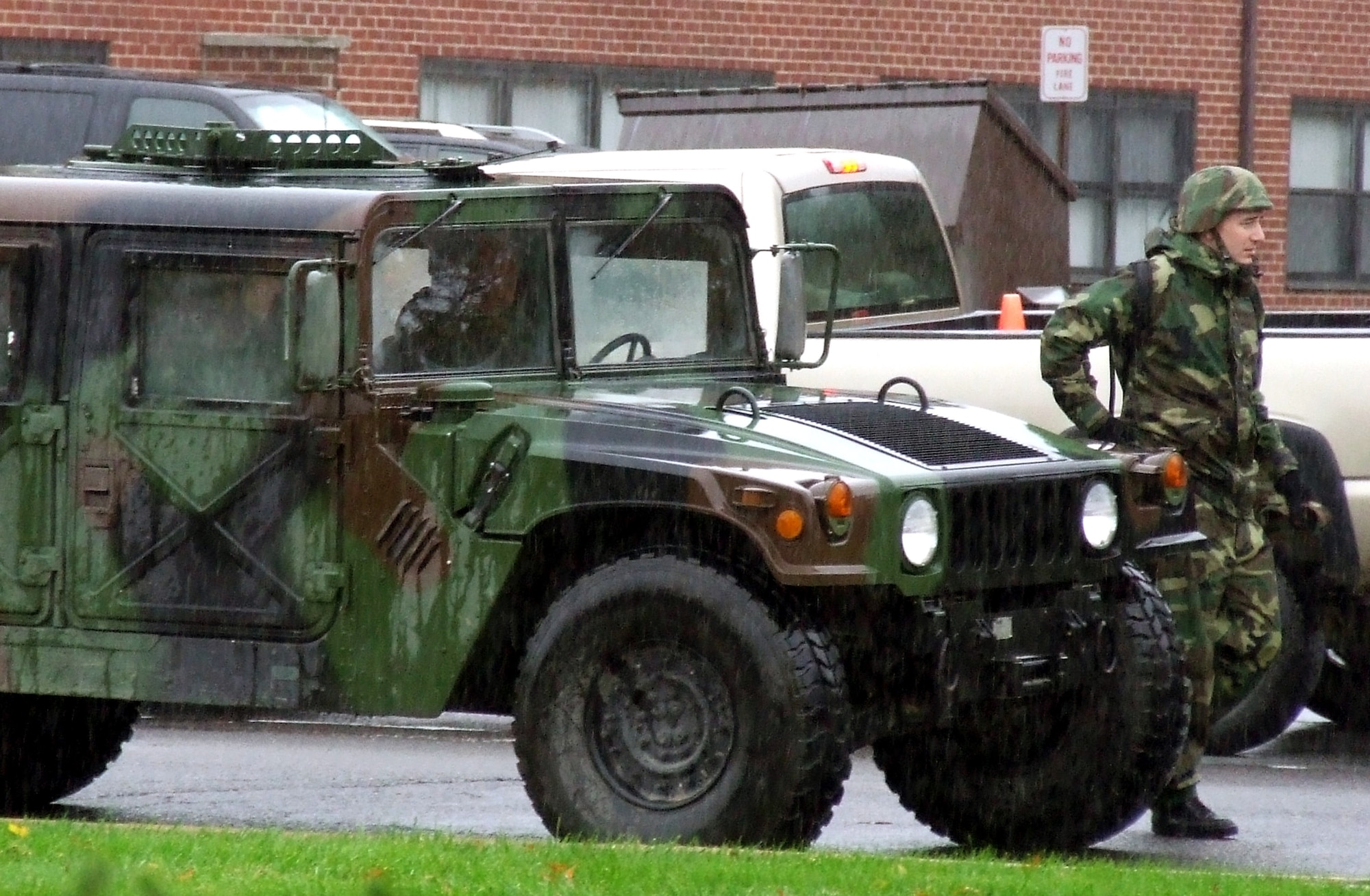 Students in the Air Force Contingency Response Group Formal Training Unit Course 08-1 and the Air Force CRG FTU Advanced Course 08-1 prepare humvees for a convoy out to a range for training on night vision operations Nov. 15 at Fort Dix, N.J. The 22-day courses are taught by the Air Force Expeditionary Center's Mobility Operations School. (U.S. Air Force Photo/Tech. Sgt. Scott T. Sturkol)