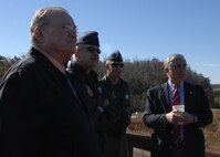 Bob Largent,  Air Force Association chairman of the board, Col. Kenneth Todorov, commander of the 23rd Wing, Col. Eric Kivi, commander of the 347th Rescue Group, and Parker Greene, executive director of the Moody Affairs Committee, depart from Moody's Grand Bay training and gunnery range after viewing a combat search and rescue demonstration including demonstrations by A-10C Thunderbolt IIs, HC-130P Combat Kings  and HH-60G Pave Hawks Dec. 5. (U.S. Air Force photo by Airman First Class Brittany Barker)