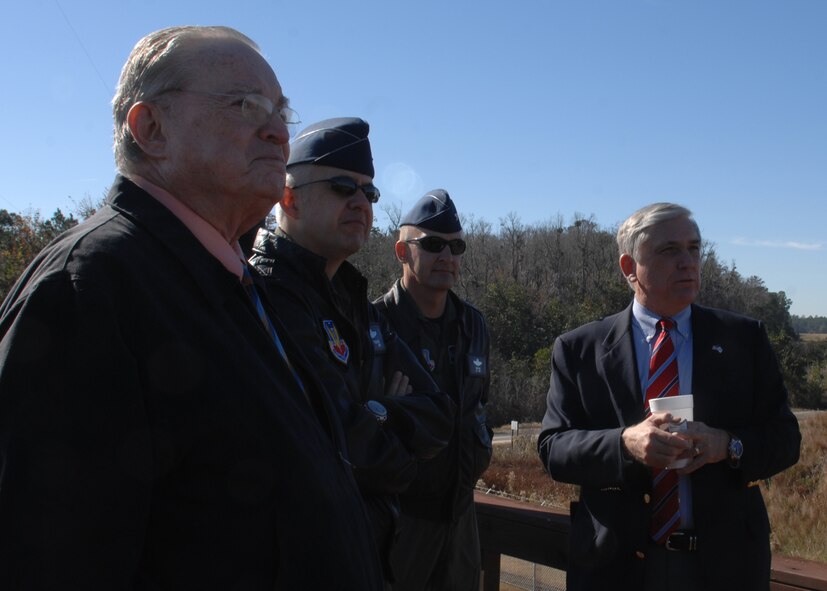 Bob Largent,  Air Force Association chairman of the board, Col. Kenneth Todorov, commander of the 23rd Wing, Col. Eric Kivi, commander of the 347th Rescue Group, and Parker Greene, executive director of the Moody Affairs Committee, depart from Moody's Grand Bay training and gunnery range after viewing a combat search and rescue demonstration including demonstrations by A-10C Thunderbolt IIs, HC-130P Combat Kings  and HH-60G Pave Hawks Dec. 5. (U.S. Air Force photo by Airman First Class Brittany Barker)