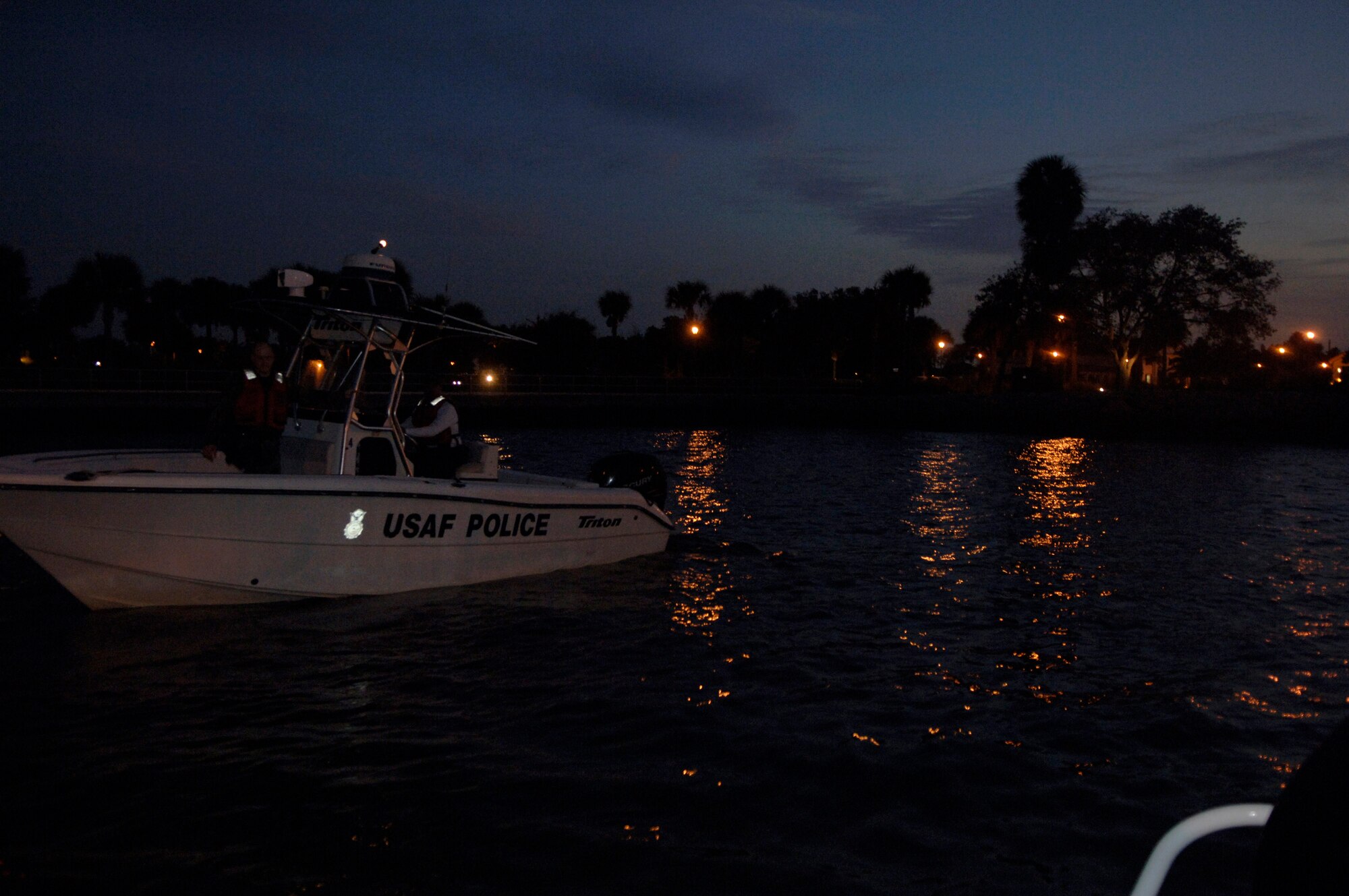 Members from the 6th Security Forces Squadron boat patrol at MacDill Air Force Base, Fla., prepare to dock Nov. 27 after patrolling Tampa Bay. The 6th SFS is one of the few security forces squadrons in the Air Force to have a boat patrol and the only one to patrol overnight. (U.S. Air Force photo/Airman Rylan Albright) 
