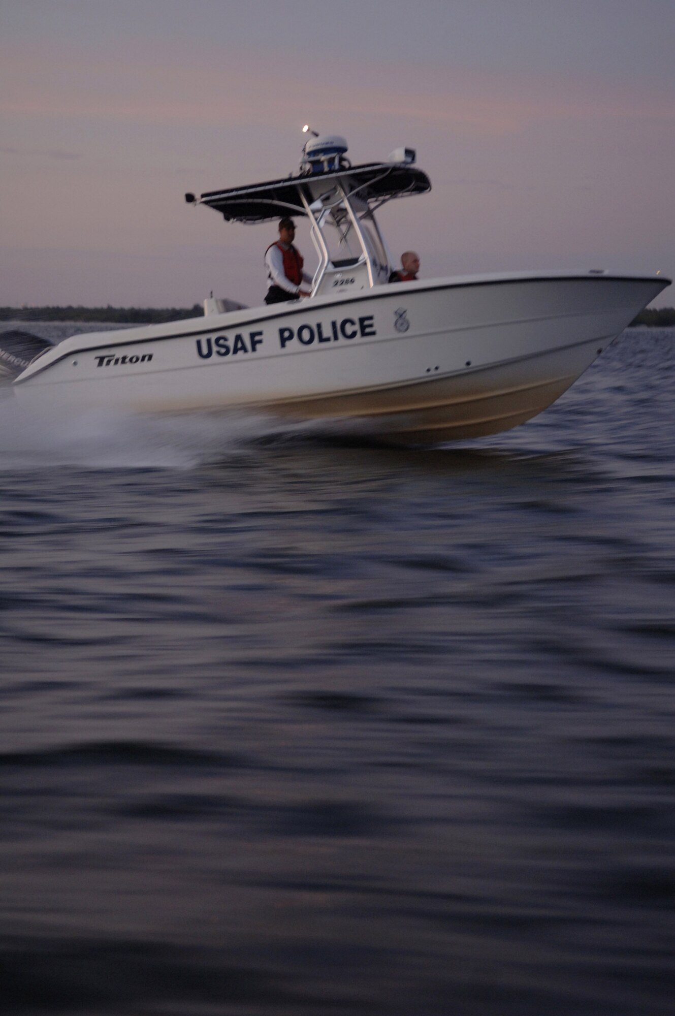 Members of the 6th Security Forces Squadron boat patrol at MacDill Air Force Base, Fla., police Tampa Bay Nov. 27.  The 6th SFS is one of the few security forces squadrons in the Air Force to have a boat patrol and the only one to patrol overnight. (U.S. Air Force photo/Airman Rylan Albright)