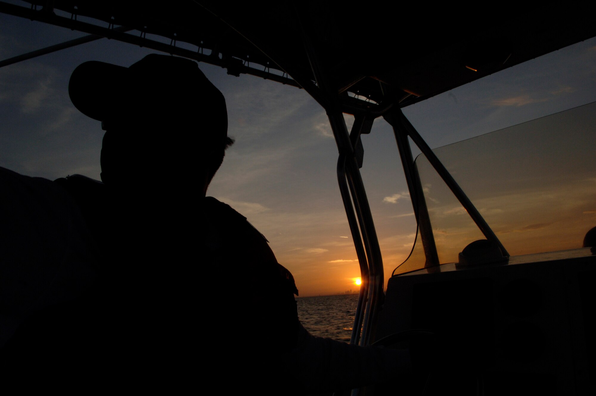 Staff Sgt. Randall Resto polices Tampa Bay Nov. 27 near MacDill Air Force Base, Fla. Sergeant Resto is a member of the 6th Security Forces Squadron boat patrol, one of the units in the Air Force to have a boat patrol and the only one to conduct patrols overnight. (U.S. Air Force photo/Airman Rylan Albright)