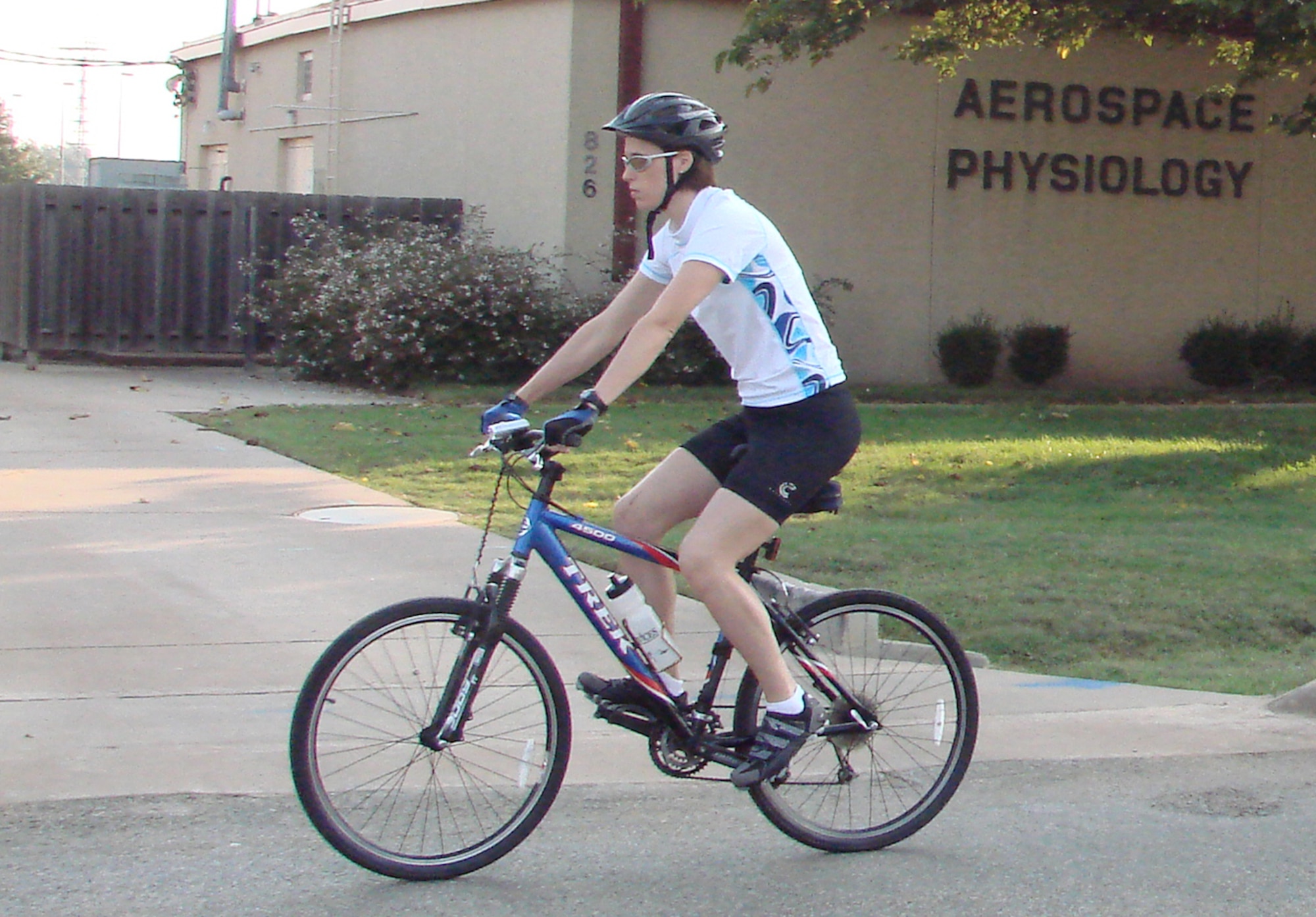 Capt. Joy Schaubhut reflects on her participation in a month-long behavior modification program, in which she put miles on her bicycle instead of her automobile for 30 days. (U.S. Air Force photo by Frank McIntyre)