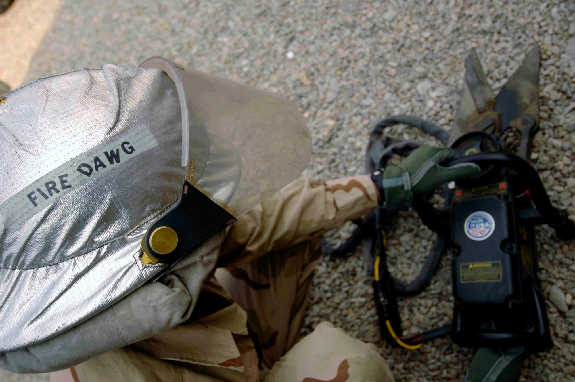 FORWARD OPERATING BASE FENTY, Afghanistan - Senior Airman Nicholas Lopez, a fire fighter here, performs an inspection of his extrication equipment, Nov. 10, 2007.  Thousands of Airmen serve in a variety of missions across Afghanistan, helping to ensure the success of Coalition efforts to bring security and stability to the Afghan people. (U.S. Air Force photo by Staff Sgt. Joshua Jasper)