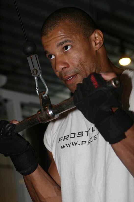 Gunnery Sgt. Philip Ricardo, an intelligence collections analyst for 3rd Marine Aircraft Wing, spends countless hours in the gym dedicating time to maintain his muscular physique. The Brooklyn, N.Y. native focuses on maintaining an evenly proportioned body. Recently, Ricardo has been working towards building his deltoid muscles. 011206-M-5690T-61