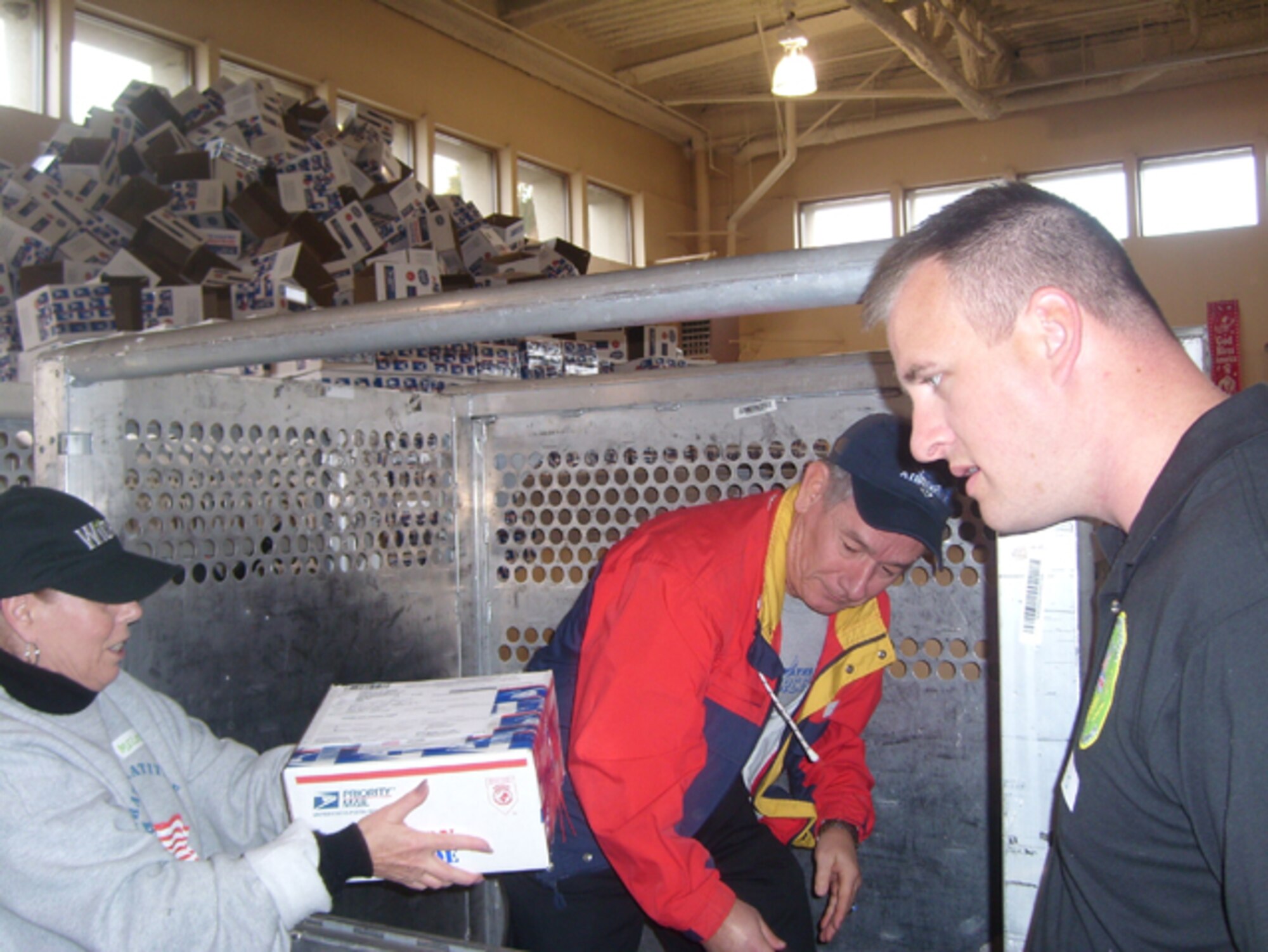 Volunteers from  Los Angeles AFB participated in Operation Gratitude, a civilian-based drive to send care pages to troops deployed overseas.  Local volunteers packed 8,000 care packages, Dec. 1. Operation Gratitude will be sending its 300,000th care package during the month of December.  Base participation was spearheaded by the GPS Wing Company Grade Officer Council.