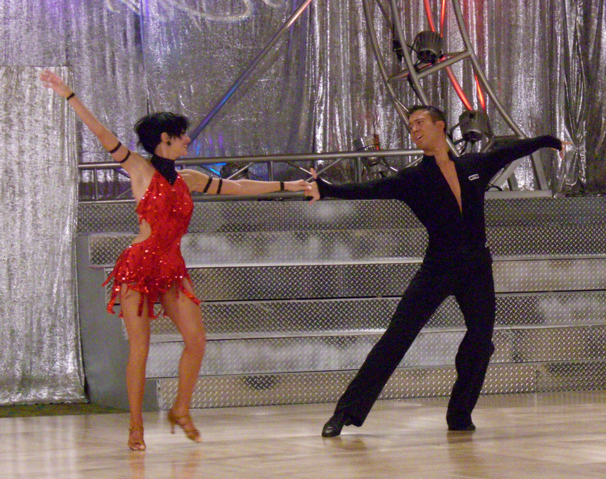 1st Lt. John Scheuren, 28th Test and Evaluation Squadron, and his partner and teacher, Georgia Ambarian, perform their “showdance” routine at a U.S. competition in September.  The lieutenant has been dancing for just over a year.  He has gone from one free lesson to second in the world in his dance category.  Photo used with permission.