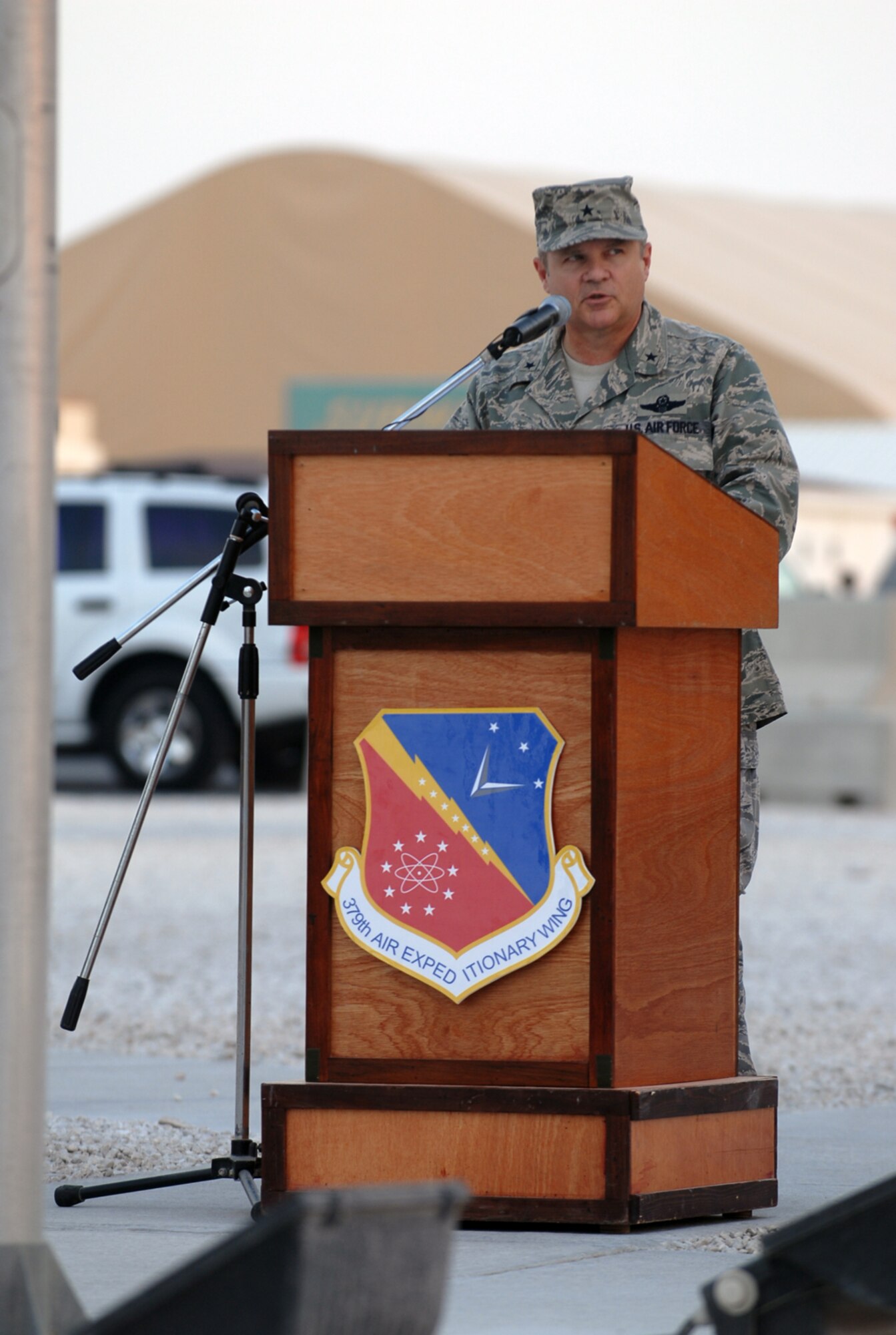 SOUTHWEST ASIA - Brig. Gen. Charlie Lyon, 379th Air Expeditionary Wing commander, speaks at a Remembrance Ceremony Dec. 7 at a Southwest Asia air base to commemorate the surprise attack on Pearl Harbor on this date in 1941. (U. S. Air Force photo/ Staff Sgt. Douglas Olsen)