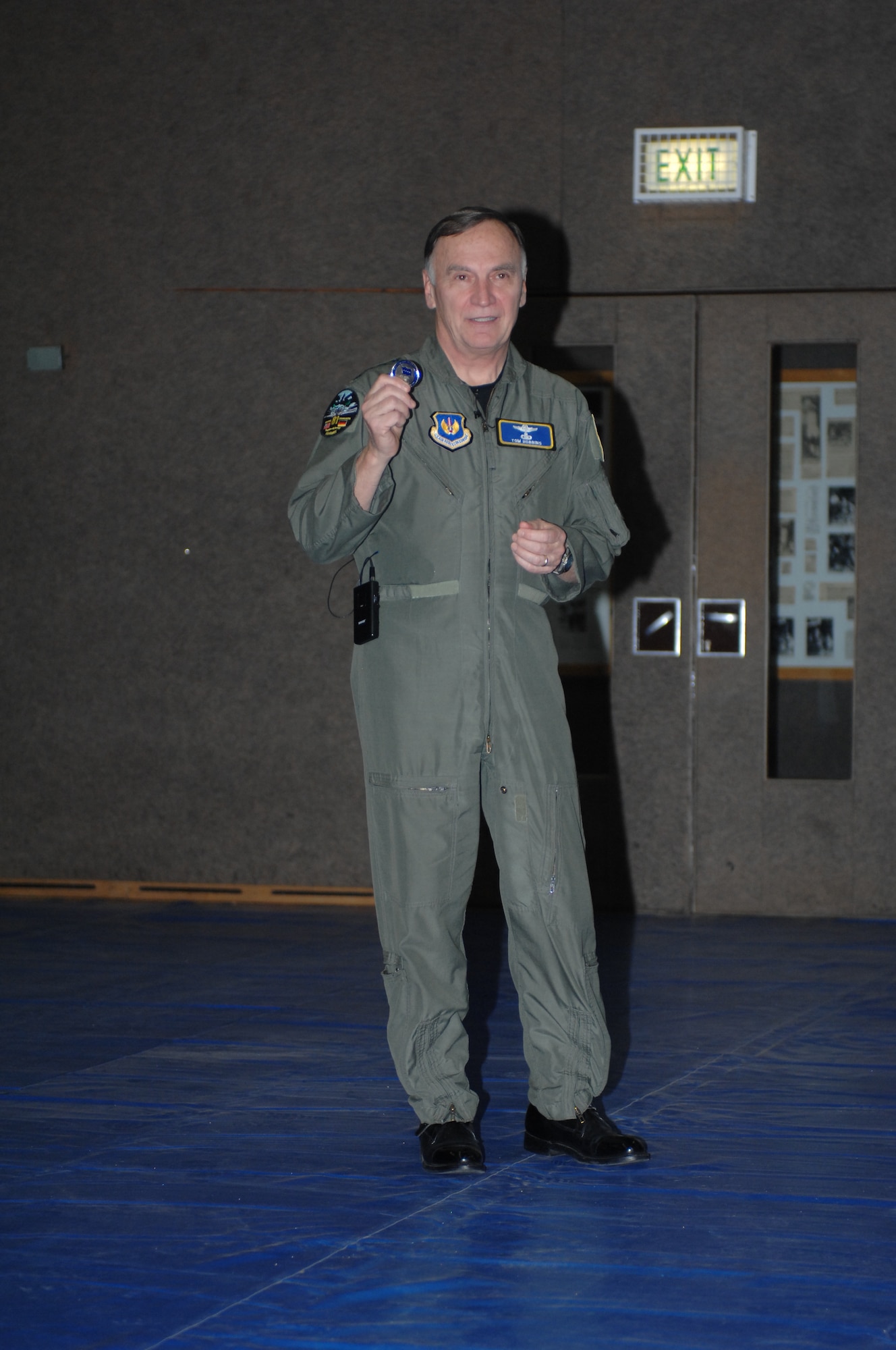 SPANGDAHLEM AIR BASE, Germany – Gen. William T. Hobbins, U.S. Air Forces in Europe commander, speaks about the unique General’s Coin he is about to present to Col. Darryl Roberson, 52nd Fighter Wing commander, during a commander’s call  Dec. 5, 2007. The coin is numbered 52 for the 52nd FW. (Air Force photo/Airman 1st Class Jenifer Calhoun)