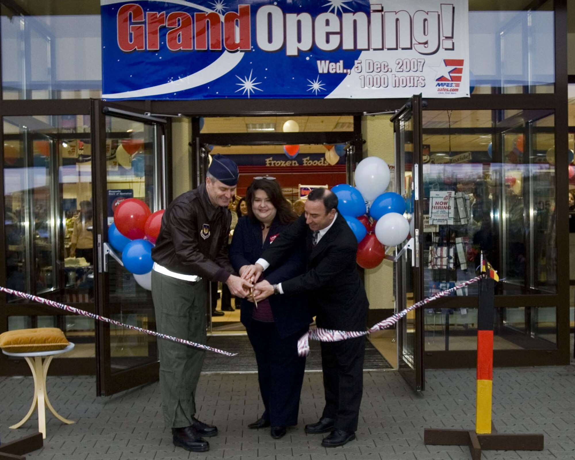 SPANGHDALEM AIR BASE, Germany – A ribbon cutting ceremony with Col. Darryl Roberson, 52nd Fighter Wing commander, Linda Adams, facility manager and Mike Strin, Spangdahlem consolidated exchange general manager, opened the center, which houses the base’s shoppette, car care center and gas station, Dec. 5, 2007. (U.S. Air Force photo/Staff Sgt. Chris Mills)