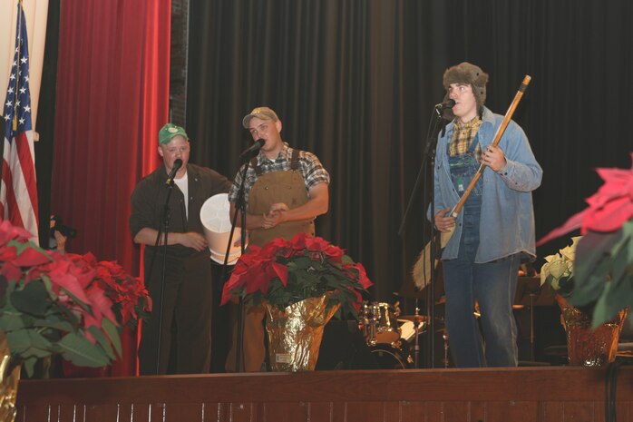 An Iraqi army soldier with 1st Battalion, 3rd Brigade, 1st Iraqi Army Division keeps watch over the entrance to a school near Abu Hazim Dec. 8. MTT 1-3-1 is currently deployed within Iraq?s Al Anbar Province to help develop Iraqi Security Forces, facilitate the development of official rule of law through democratic government reforms and continue the development of a market based economy centered on Iraqi reconstruction.