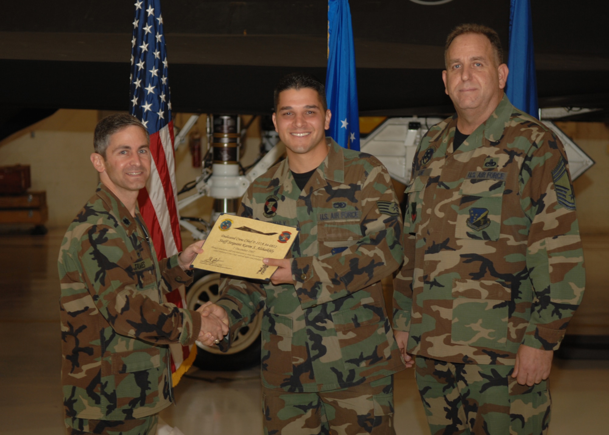 The 49th Aircraft Maintenance Squadron recognizes eight crew chiefs during the Dedicated Crew Chief Appointment Ceremony Dec. 7, 2007, at Holloman Air Force Base, N.M. To be a Dedicated Crew Chief, an Airman must have a minimum of six months' experience and be a staff sergeant or higher or be a waivered Senior Airman. A Dedicated Crew Chief is responsible for all maintenance on the aircraft he/she has assigned. (U.S. Air Force photo/Airman 1st Class Jamal D. Sutter)