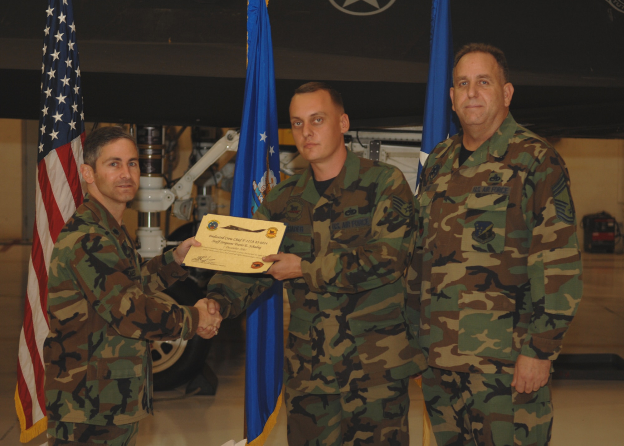 The 49th Aircraft Maintenance Squadron recognizes eight crew chiefs during the Dedicated Crew Chief Appointment Ceremony Dec. 7, 2007, at Holloman Air Force Base, N.M. To be a Dedicated Crew Chief, an Airman must have a minimum of six months' experience and be a staff sergeant or higher or be a waivered Senior Airman. A Dedicated Crew Chief is responsible for all maintenance on the aircraft he/she has assigned. (U.S. Air Force photo/Airman 1st Class Jamal D. Sutter)