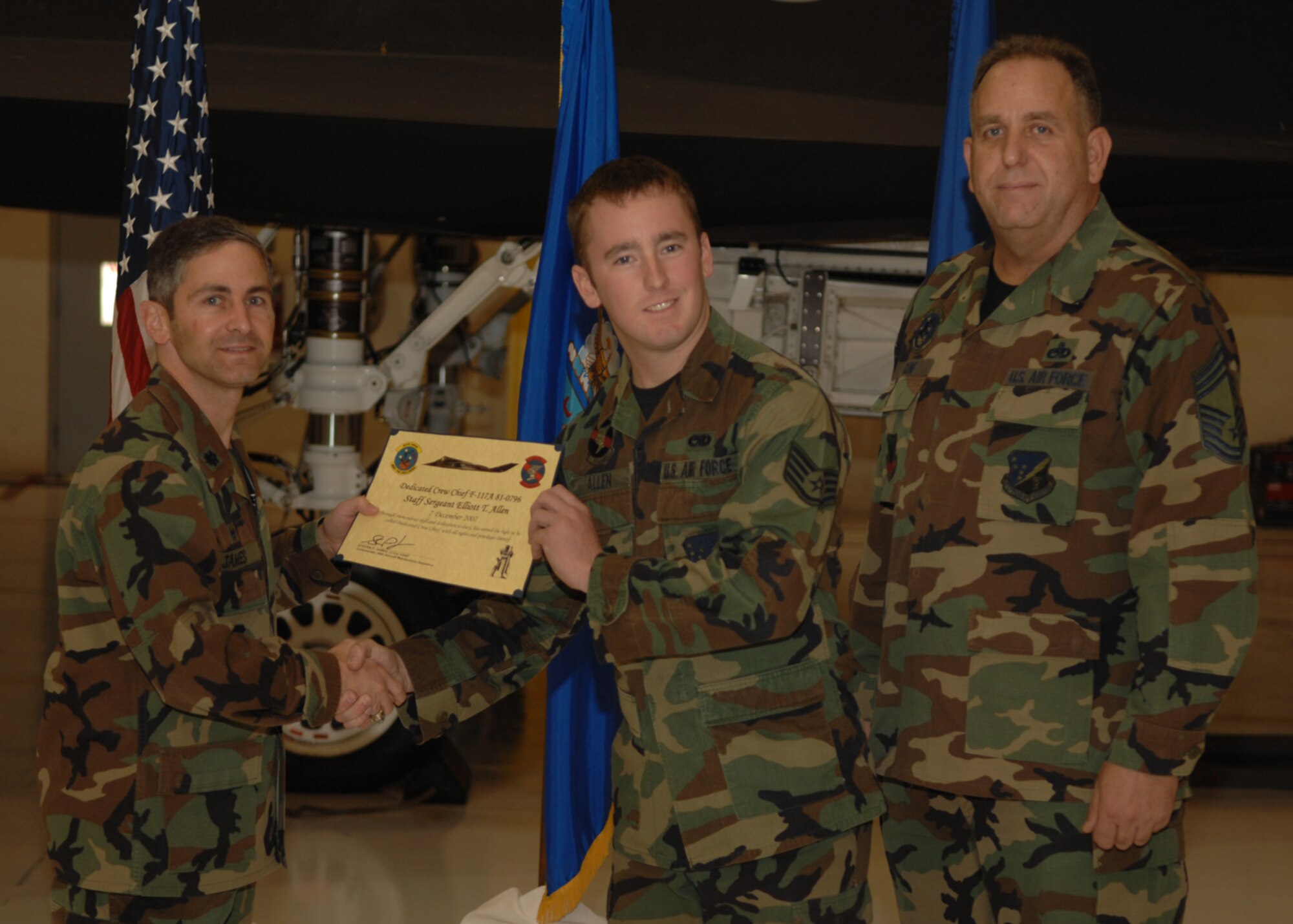 The 49th Aircraft Maintenance Squadron recognizes eight crew chiefs during the Dedicated Crew Chief Appointment Ceremony Dec. 7, 2007, at Holloman Air Force Base, N.M. To be a Dedicated Crew Chief, an Airman must have a minimum of six months' experience and be a staff sergeant or higher or be a waivered Senior Airman. A Dedicated Crew Chief is responsible for all maintenance on the aircraft he/she has assigned. (U.S. Air Force photo/Airman 1st Class Jamal D. Sutter)