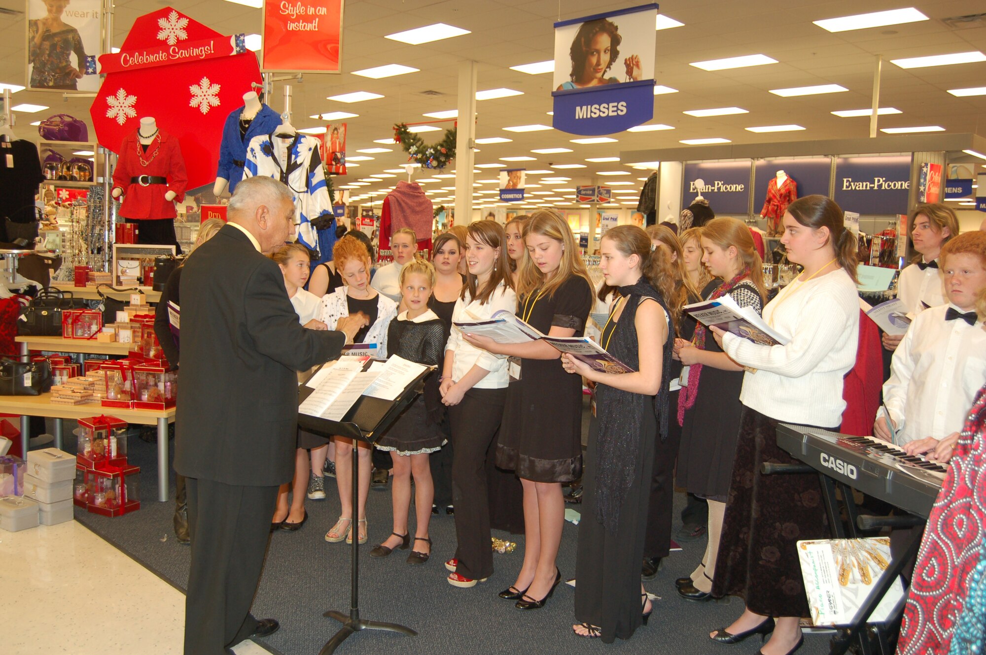 The Hanover School District 28 choir performed at the Base Exchange Dec. 5. Music director Fernando Ornelas led the students in classic holiday songs for the many holiday shoppers at the store. (U.S. Air Force photo by Corey Dahl)
