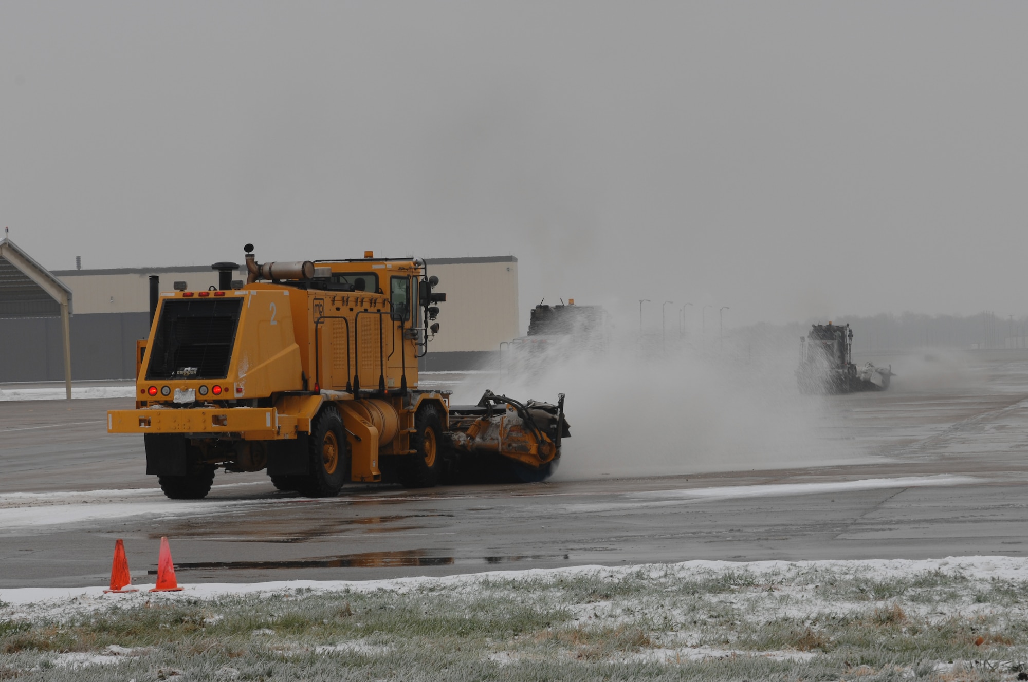 WHITEMAN AIR FORCE BASE, Mo. – The 509th Civil Engineer Squadron Snow Control plows the flight line Dec. 10. (U.S. Air Force photo/Tech. Sgt. Samuel A. Park)