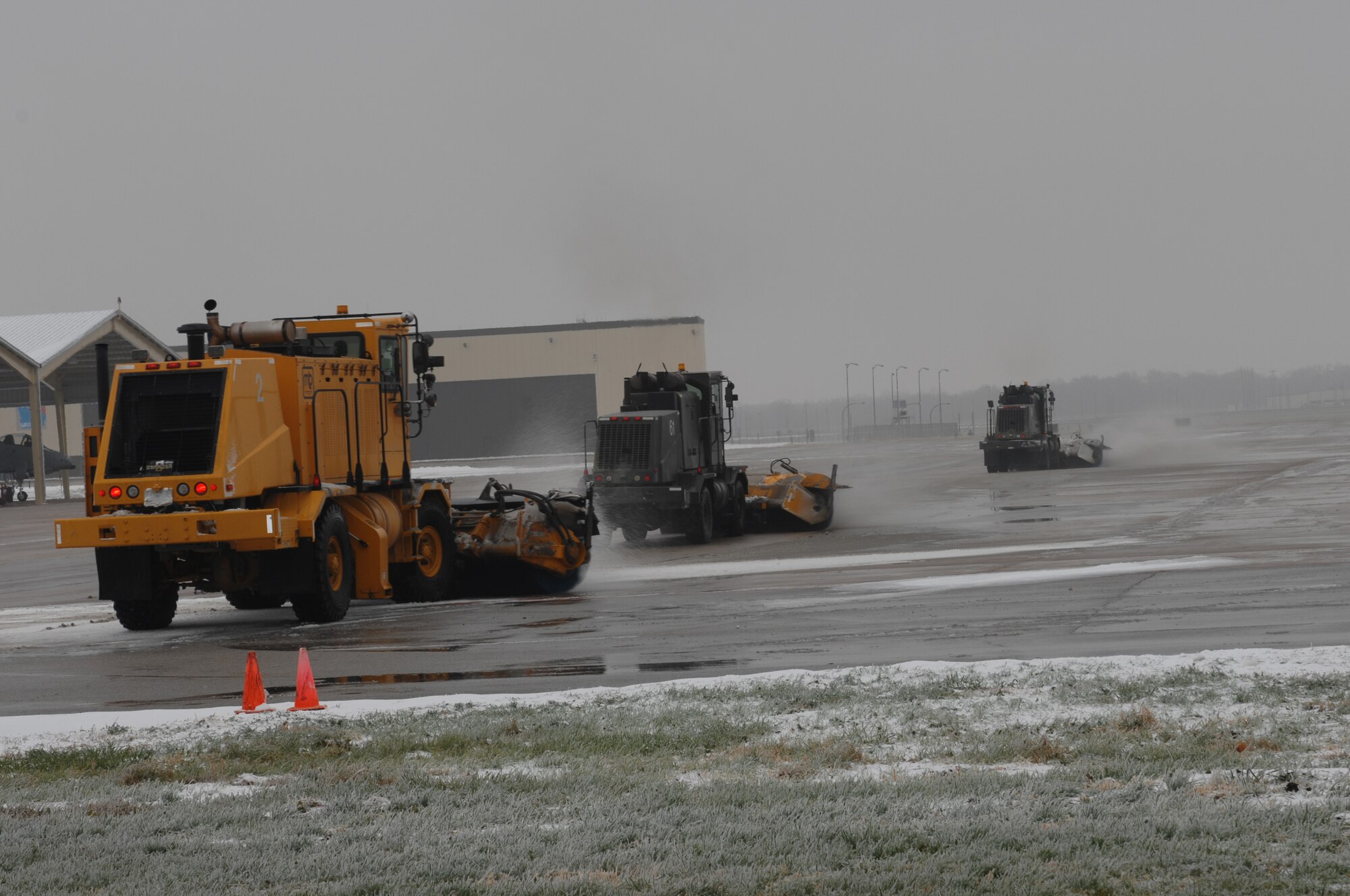 WHITEMAN AIR FORCE BASE, Mo. – Civil Engineer Squadron Snow Control plows the flight line Dec. 10. Two snow crews, one on the flight line and one on the base streets have been plowing since 7A.M. Dec. 9. (U.S. Air Force photo/Tech. Sgt. Samuel A. Park)