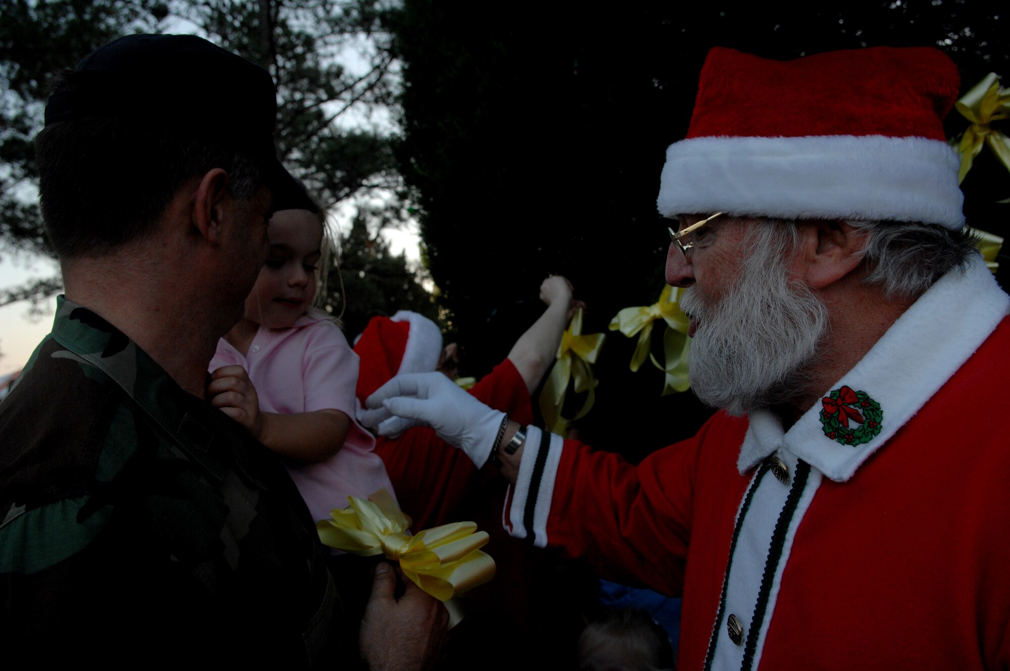 MOODY AIR FORCE BASE, Ga. -- Santa Claus visits with children at the base Christmas tree lighting ceremony  Nov. 7. The evening also included a snow ball field and a Christmas parade. (U.S. Air Force photo by Airman 1st Class Gina Chiaverotti)  