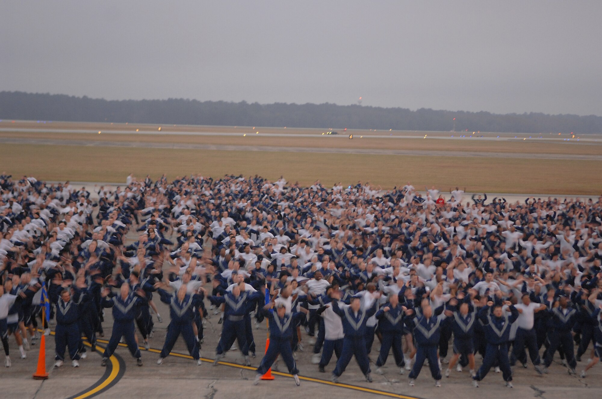 MOODY AIR FORCE BASE, Ga. -- Team Moody warms up on the flight line before the Wingman Day 5K run Dec. 7. Wingman day is held annually to reinforce the value of teamwork in every Airman's daily activities. (U.S. Air Force photo by Airman 1st Class Brittany Barker) 