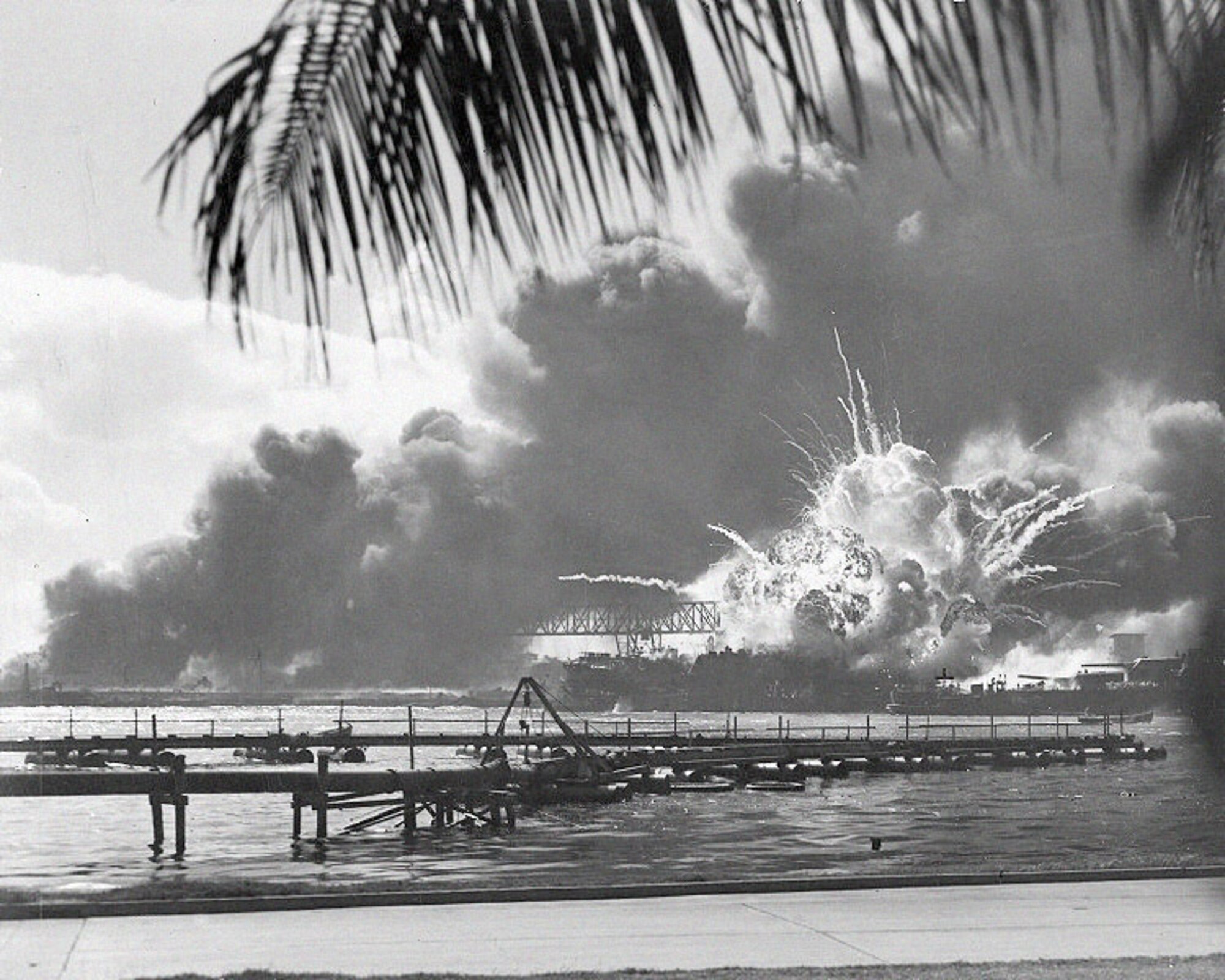 A Navy photographer snapped this photograph of the Japanese attack on Pearl Harbor in Hawaii Dec. 7, 1941, just as the USS Shaw exploded. (Courtesy photo) 