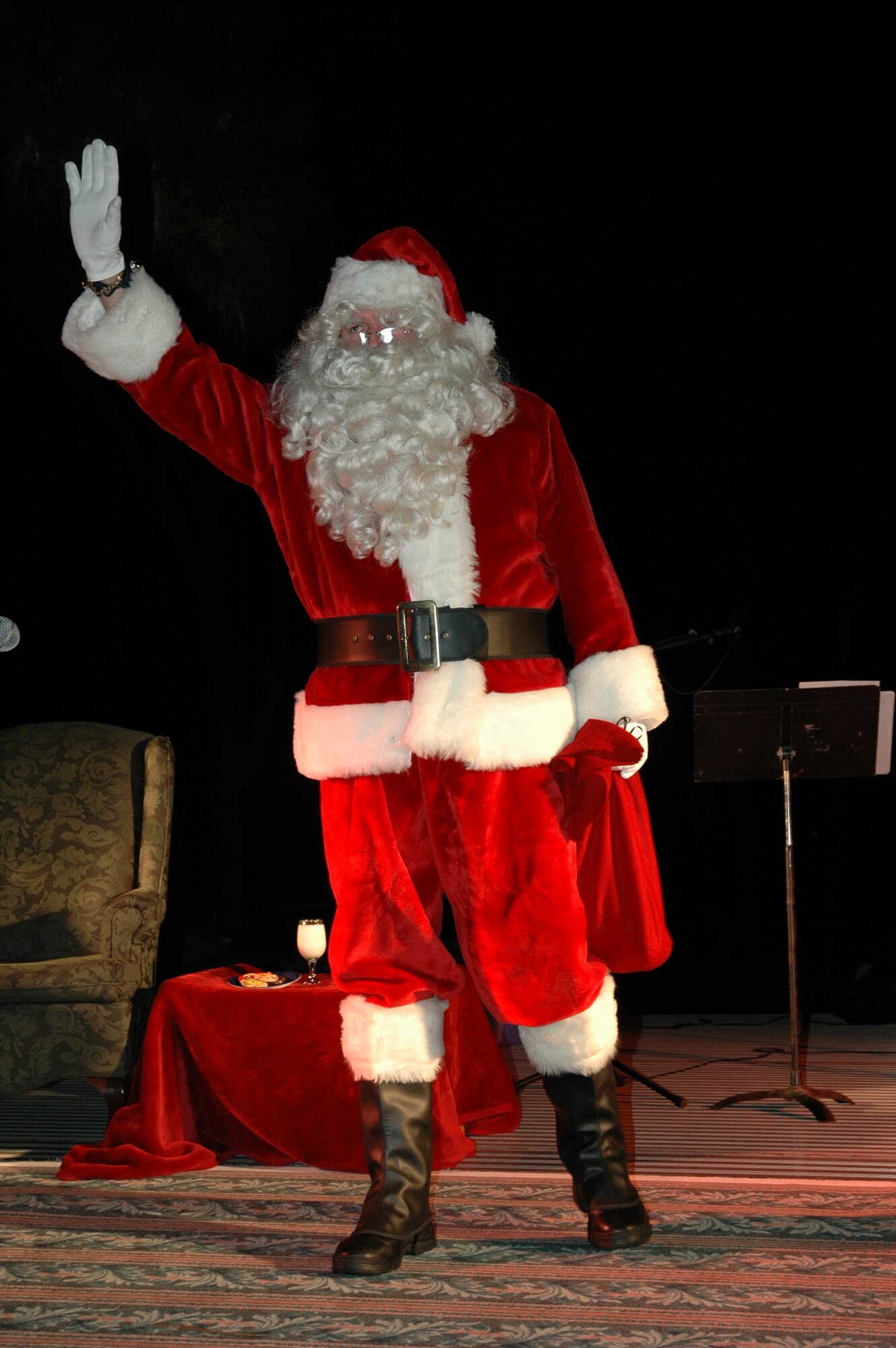 Santa Claus visited Tyndall Air Force Base during Tyndall's annual Christmas tree lighting Dec. 6.  Children lined up to sit on Santa's lap and told him what they wanted for Christmas. (Air Force photo by Airman 1st Class Anthony J. Hyatt)