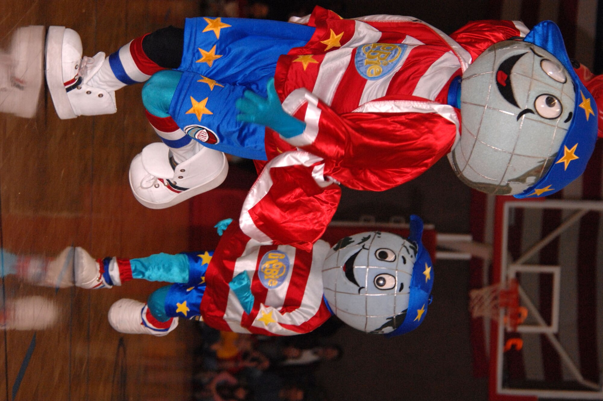 SPANGDAHLEM AIR BASE, Germany – Globie, the Harlem Globetrotters mascot, pumps up the crowd at the Skelton Memorial Fitness Center here Dec. 6. Globie represents the team’s fans around the world throughout their eight decades of existence. (U.S. Air Force photo/Senior Airman Kristin Ruleau)
