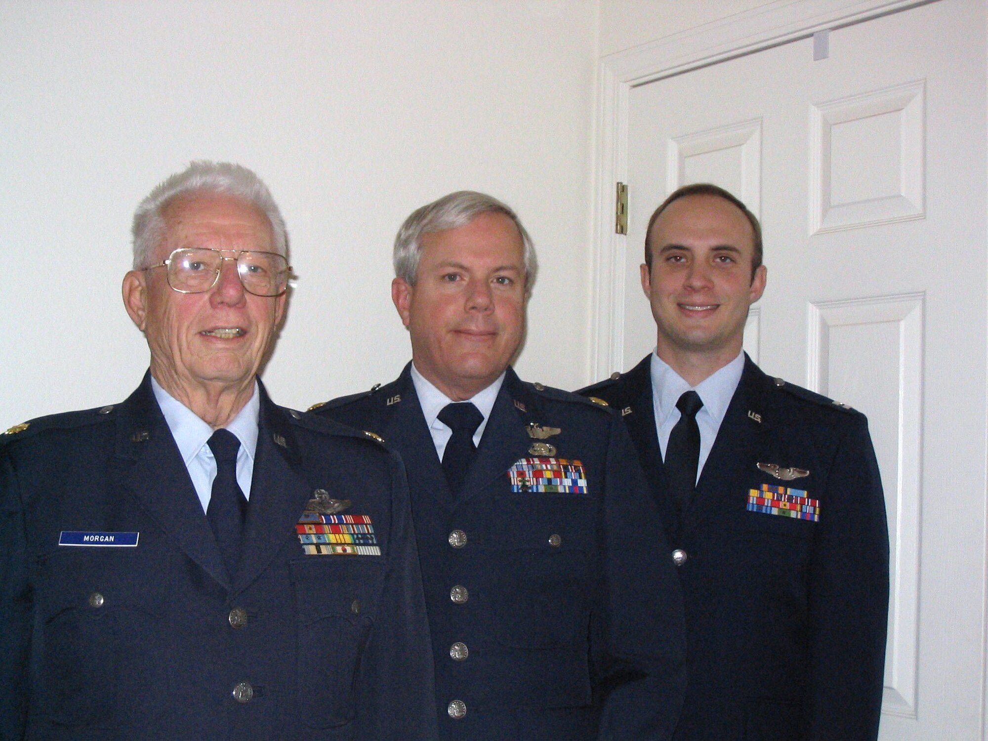 Retired majors David Morgan Jr., and Pat Morgan and Maj. David Morgan line up in their service dress uniform. All three generations of the Morgan family have flown the C-130 Hercules. Courtesy photo