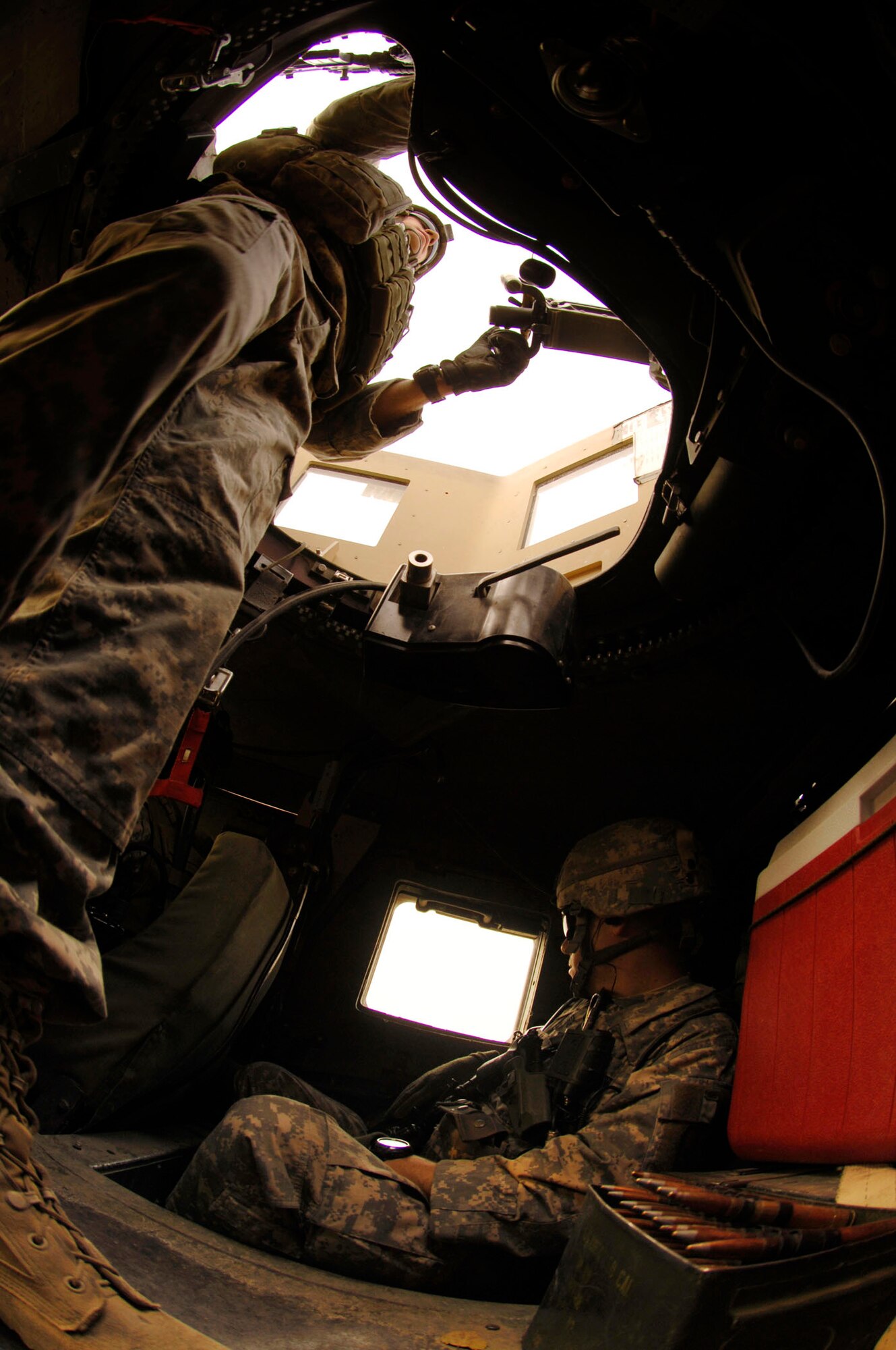 NANGARHAR PROVINCE, Afghanistan – An Army gunner in the turret of a High Mobility Multipurpose Wheeled Vehicle, keeps a careful eye on traffic while on a canal assessment mission with the Nangarhar Provincial Reconstruction Team, Nov. 10, 2007.  

The Nangarhar PRT is a joint team of Airman, Soldiers, and representatives from the U.S. Department of State, the U.S. Agency for International Development and the U.S. Department of Agriculture.  The team is responsible for helping the Government of the Islamic Republic of Afghanistan improve security, governance and promote reconstruction in Nangarhar Province.  The PRT assesses community needs and then builds schools, government centers, roads, medical capability and basic infrastructure throughout Nangarhar Province.  (U.S. Air Force photo by Staff Sgt. Joshua T Jasper)
