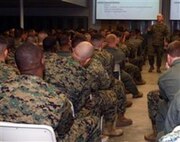 Gunnery Sgt. Trenton Widdis, company gunnery sergeant, Company B, Chemical Biological Incident Response Force, II Marine Expeditionary Force, speaks to Marines and sailors about safety at a safety brief here Nov. 20. CBIRF Marines learned about motorcycle safety, suicide prevention and vehicle safety. Safety is a top priority for Marine Corps commands, and there are several resources Marines and sailors can use to minimize off-duty incidents including logging on to www.safetycenter.navy.mil.