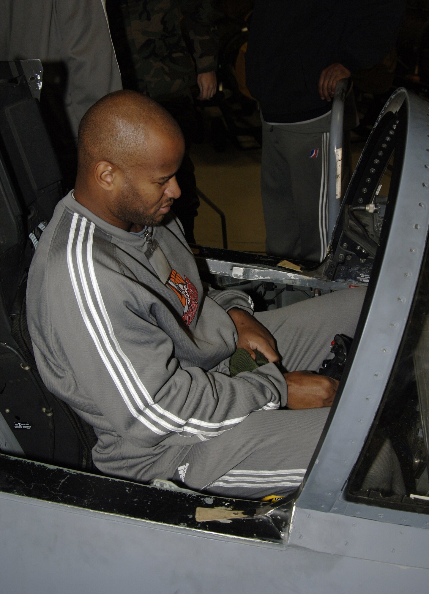 MOUNTAIN HOME AIR FORCE BASE, Idaho -- Randy Livingston, a member of the Idaho Stampede basketball team, checks out the cockpit of an F-15C here Dec.10. The Idaho Stampede is a member of the NBA D-league with its base of operations in Boise, Idaho. (U.S. Air Force photo/ Staff Sgt. Rodney D. Ivey)