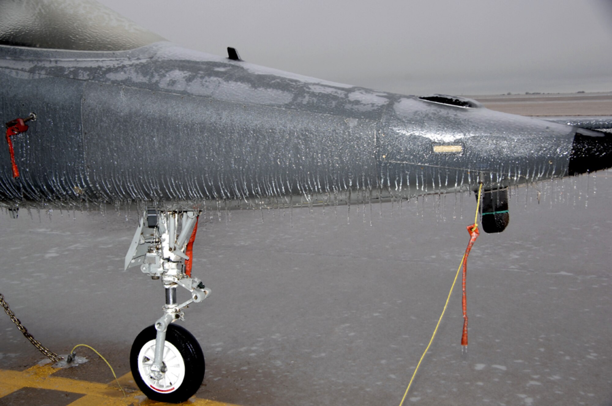 Wind, water and fluctuating temeratures give a Vance Air Force Base T-38C Talon nose a coat of icicles. (U.S. Air Force photo by Terry Wasson) 