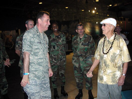 Mr. Richard E. Cole talks about his about his Doolittle's Raid experience with Maj. Gen. Gar Graham, Air Force Assistant Surgeon General for Dental Services, at the Pacific Aviation Museum. Mr. Cole was the co-pilot in the cockpit with Lt.Col. Jimmy Doolittle during the historic raid on Tokyo which brought the fight to mainland Japan. (U.S. Air Force photo/Capt. Maria Lamas) 
