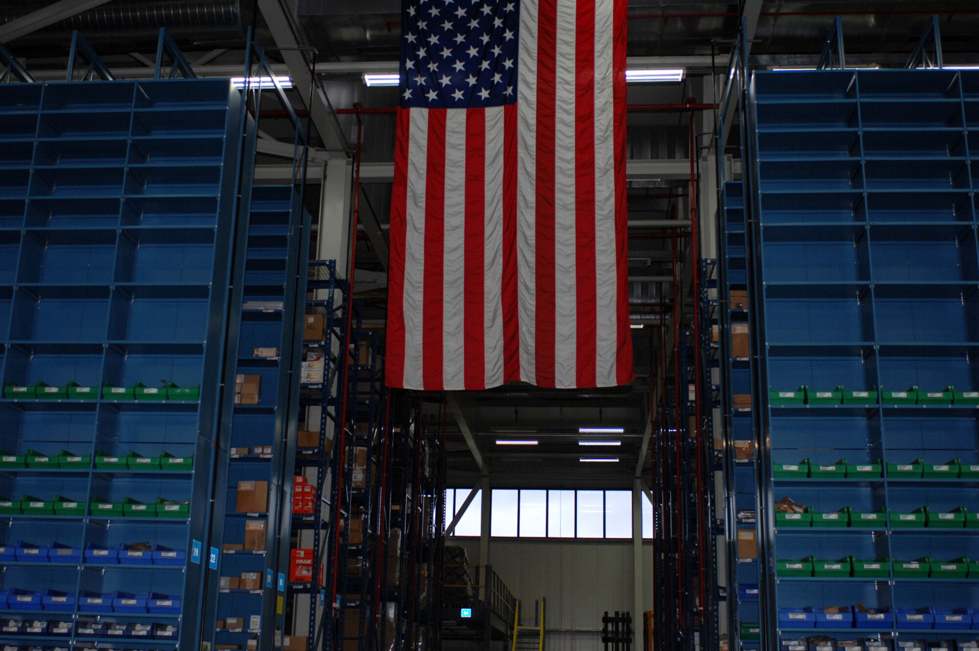 SPANGDAHLEM AIR BASE, Germany – The American flag hangs on display at the 52nd Logistics Readiness Squadron warehouse on Spangdahlem Air Base Dec. 10, 2007. The warehouse supports 68 facilities and eight geographically separated units. (U.S. Air Force photo/Airman 1st Class Jenifer Calhoun)