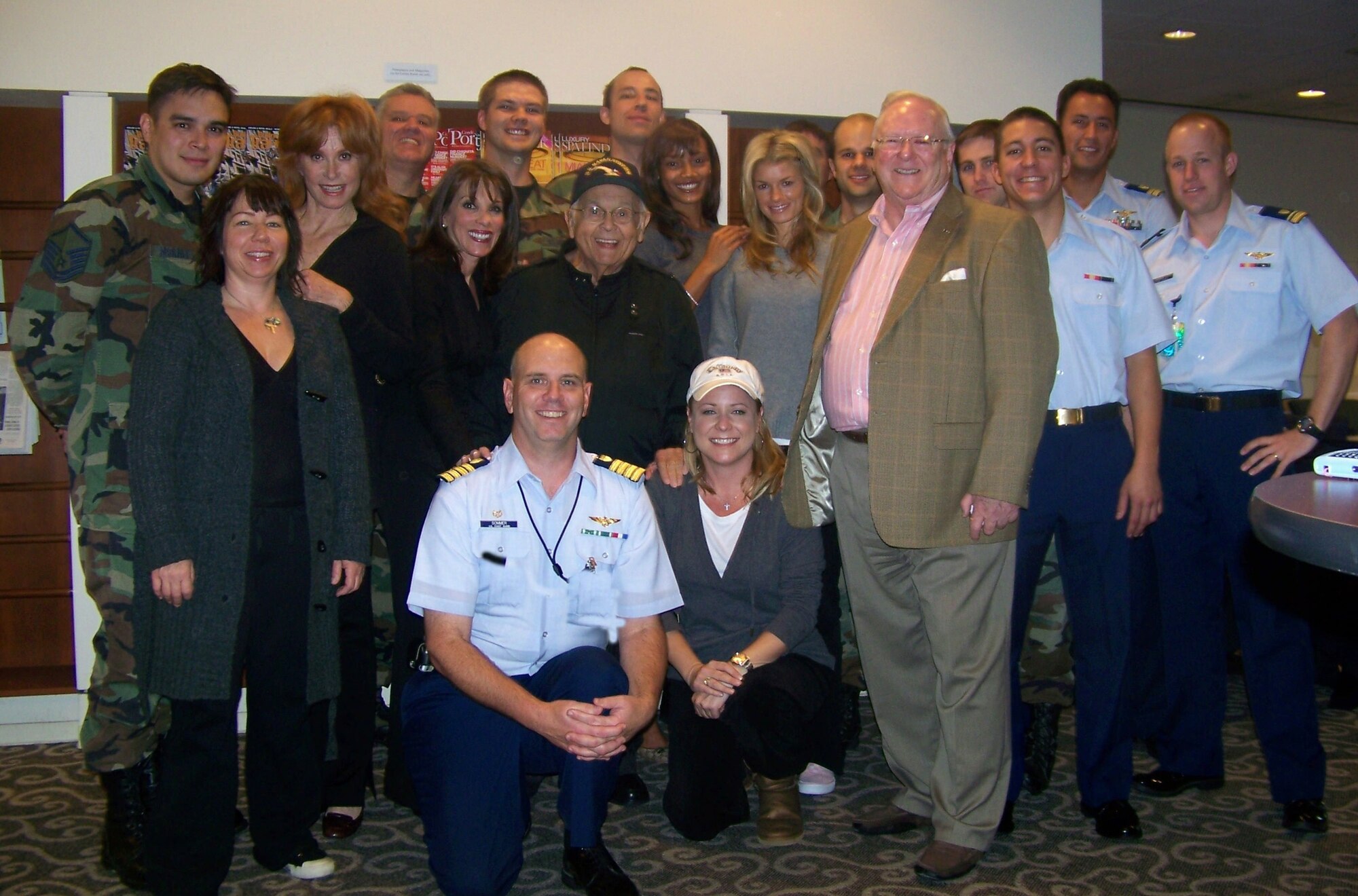 A group of Airmen from Los Angeles Air Force Base and local Coast Guard members were recently at LAX to send off Hollywood Honorary Mayor Johnny Grant on his 60th - and final - overseas tour to entertain U.S. troops stationed at Guantanamo Bay, Cuba. Joining Grant on the tour are Victoria's Secret models Selita Banks, Adriana Lima and Marisa Miller, and actresses Stefani Powers, Kate Linder and Karri Turner.
