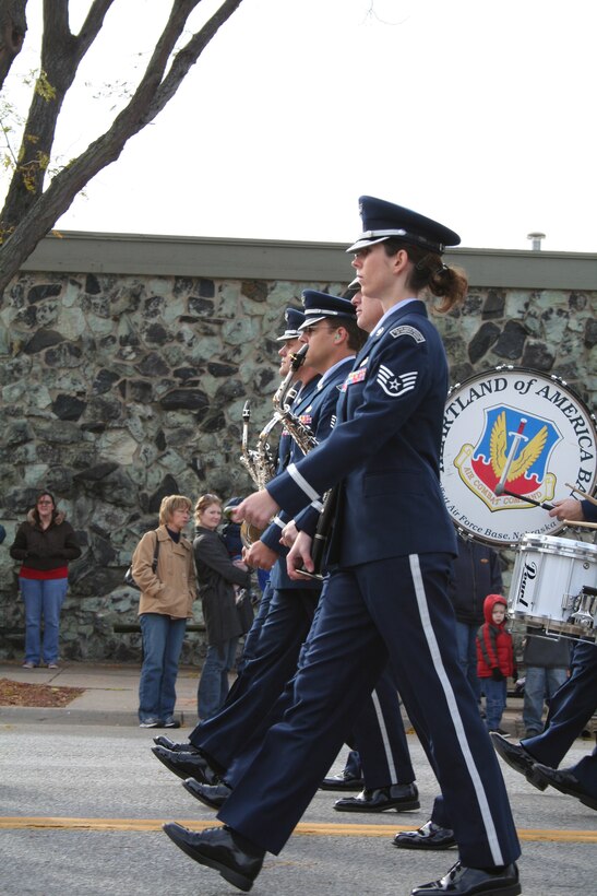 Members of the USAF Heartland of America Band all step together in the 2007 Veterans Day Parade in Bellevue, NE.  The parade is an annual event for military members stationed at Offutt Air Force, and is well-attended by the surrounding community.