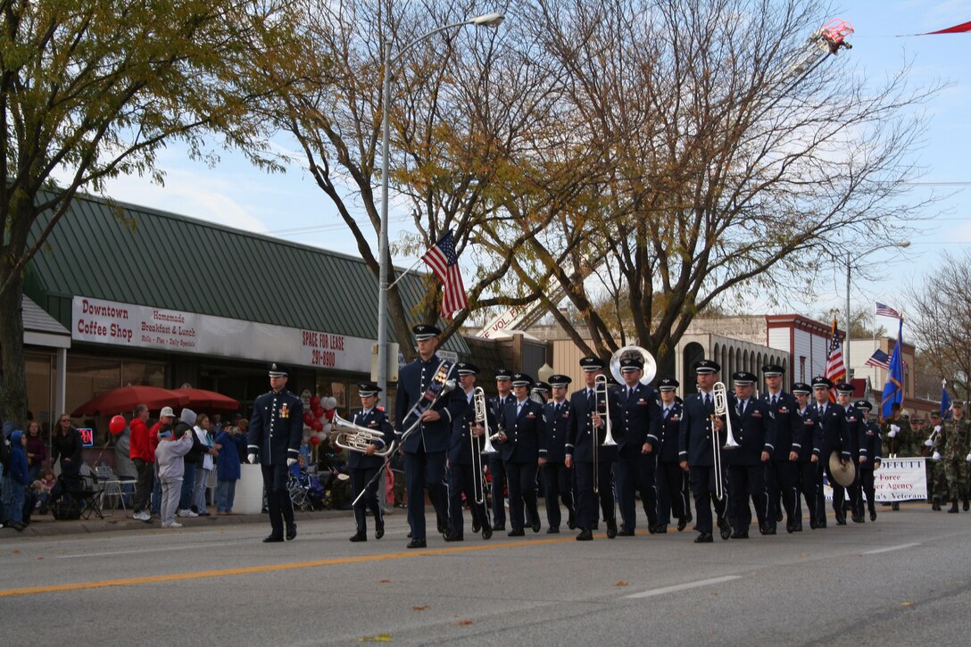 The USAF Heartland of America Band, under the command of Captain Michael Willen, steps off as part of the 2007 Veterans Day Parade in Bellevue, NE.  The parade is an annual event for military members stationed at Offutt Air Force and is well-attended by the surrounding community.