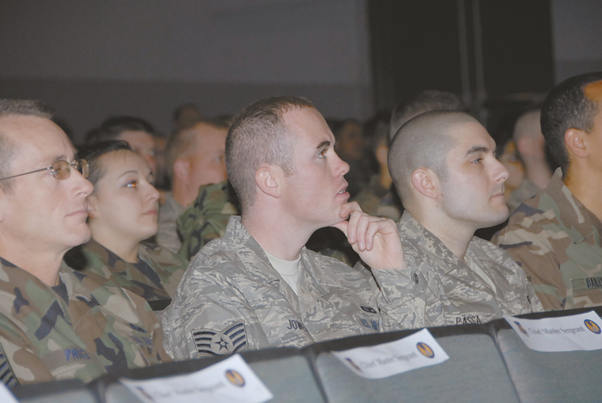 Members of the audience listen intently to Gen. Carlson's words during the Enlisted Call at the base theater Dec. 10.  (Skywrighter photo by Christy Webb)