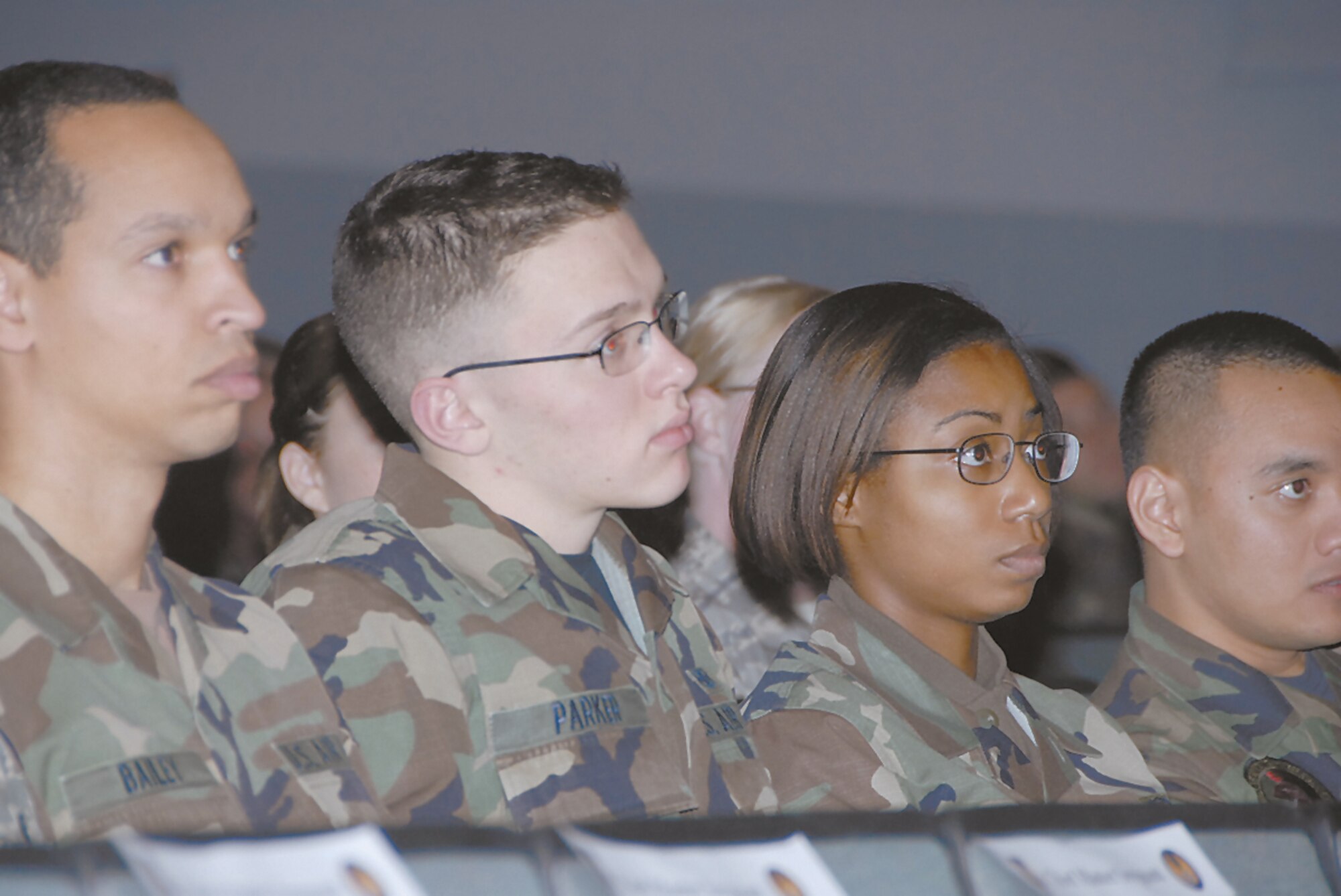 Enlisted servicemembers consider thoughfully the weight of Gen. Bruce Carlson's words to them at Monday's enlisted call at the base theater in Kittyhawk Center.  (Skywrighter photo by Christy Webb)