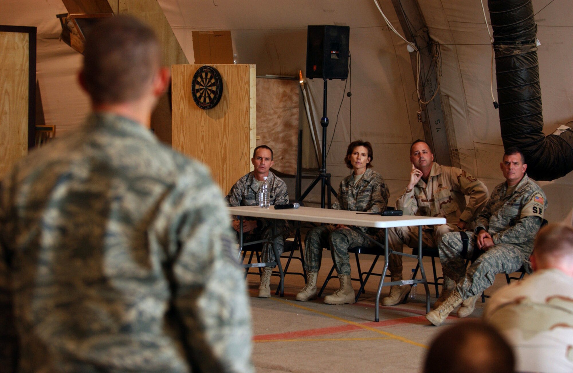 Tech. Sgt. Anthony Reitz asks a question during an open forum with senior enlisted Airmen Dec. 8 at Ali Base, Iraq. The Top 3 Council hosted a Senior NCO Mentorship Seminar for mid-tier enlisted Airmen. Sergeant Reitz is assigned to the 407th Expeditionary Civil Engineer Squadron and is deployed from Little Rock Air Force Base, Ark. (U.S. Air Force photo/Airman 1st Class Jonathan Snyder)
